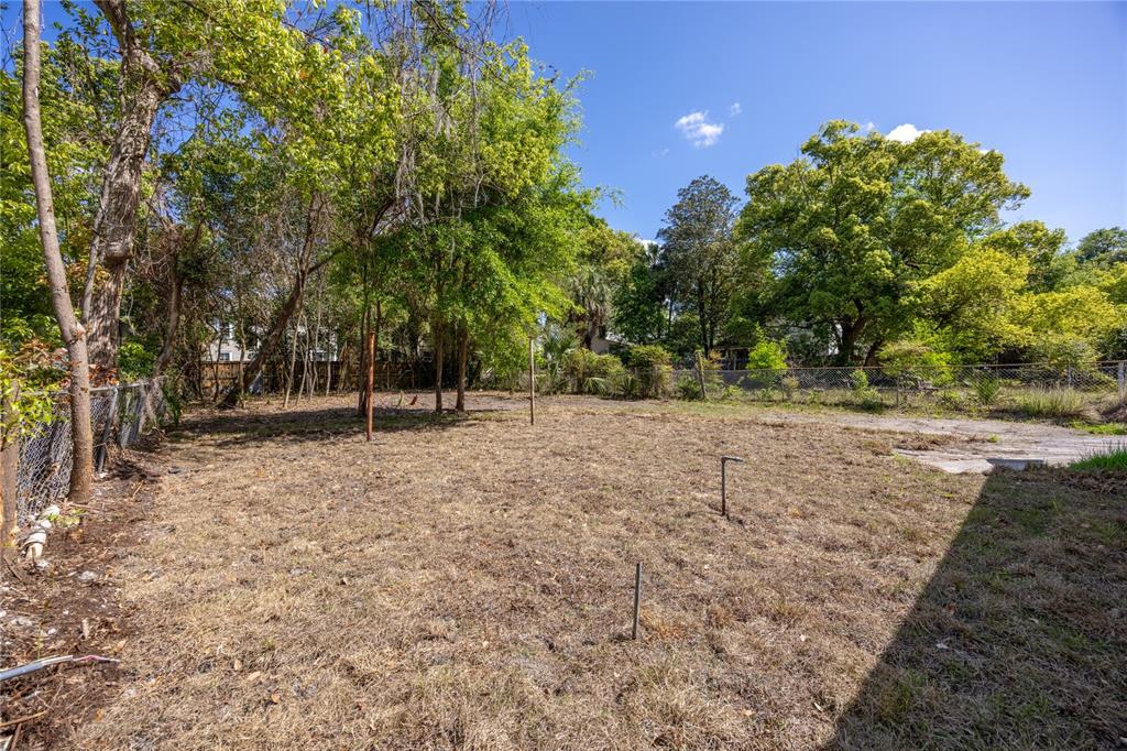 418 Northwest 3rd Avenue Gainesville, FL 32601 - Photo 31 of 31 a view of outdoor space with deck and trees