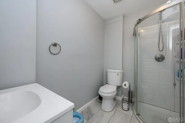 a bathroom with a sink and toilet
