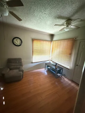 a room with furniture and a window
