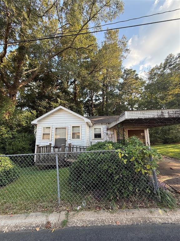 819 Mignon Street Minden, LA 71055 - Photo 9 of 9 a view of a house with a yard