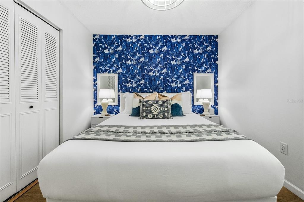 2911 Woodpine Court Sarasota, FL 34231 - Photo 38 of 88 a bedroom with a bed and window