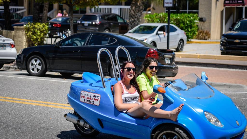 2911 Woodpine Court Sarasota, FL 34231 - Photo 84 of 88 a front view of a house with outdoor seating
