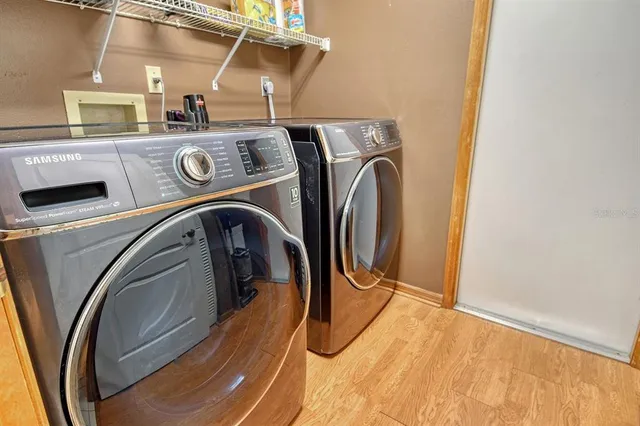 a view of a house with swimming pool