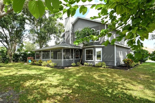 a view of a house with swimming pool