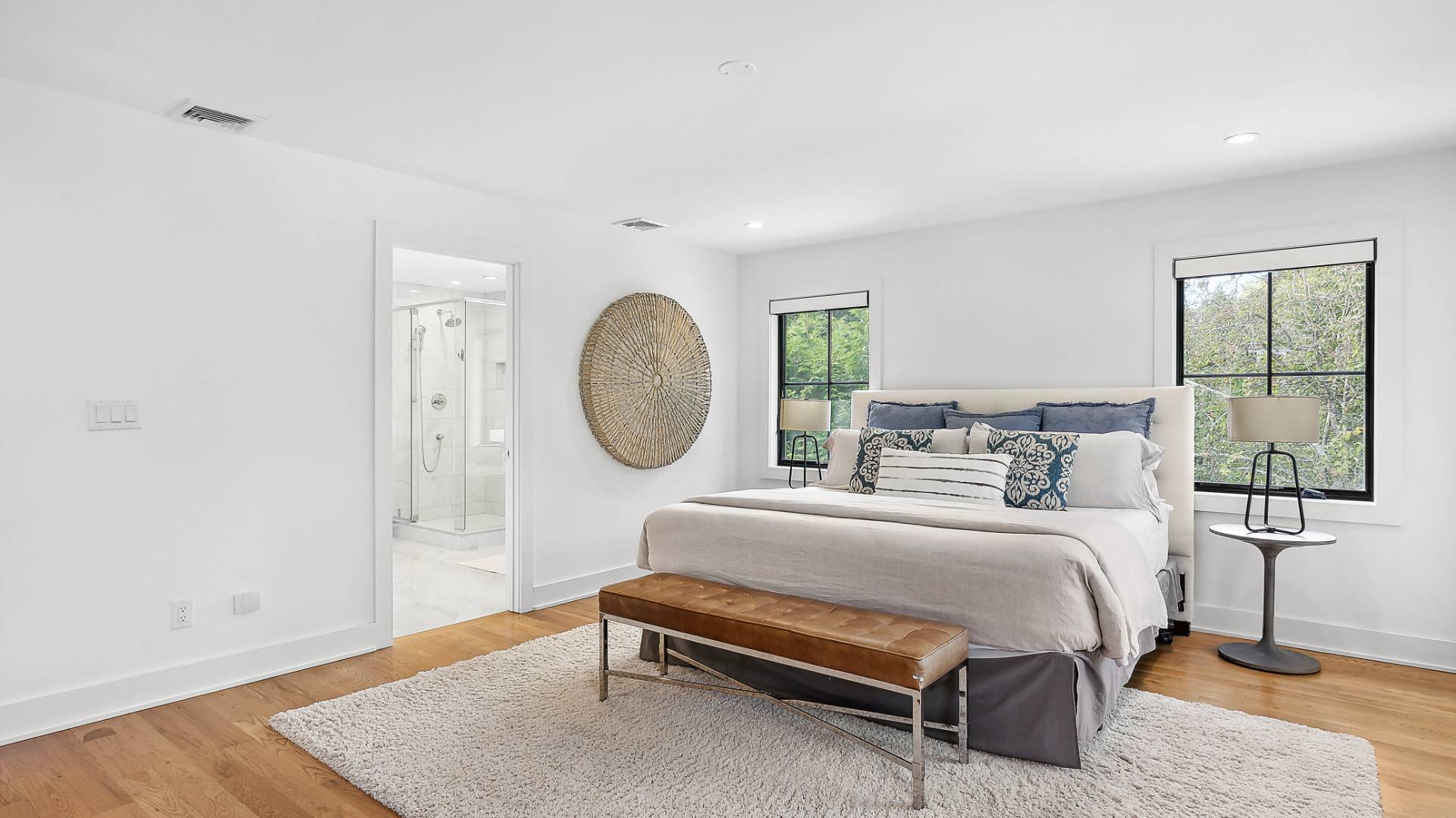 6 Inkberry Street East Hampton, NY 11937 - Photo 6 of 18 a bedroom with a bed a window and dresser