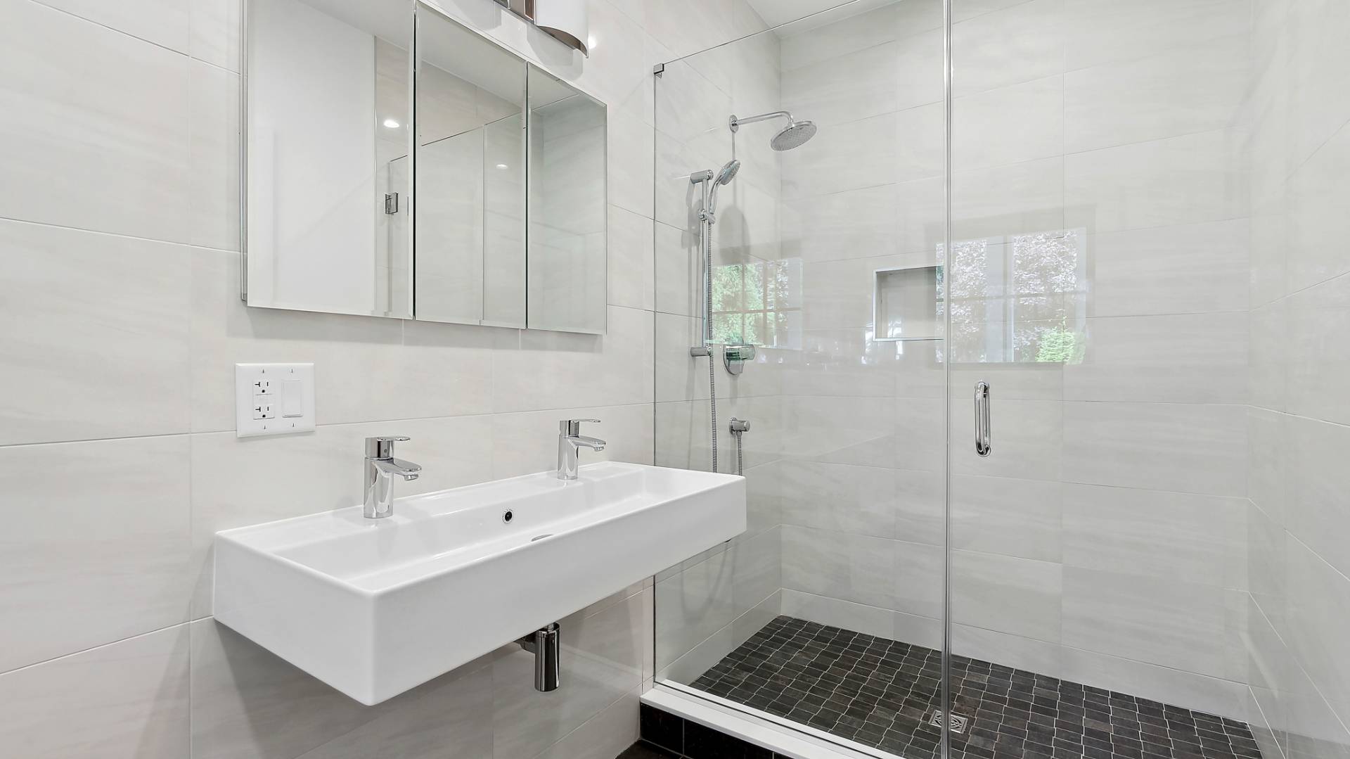 6 Inkberry Street East Hampton, NY 11937 - Photo 9 of 18 a bathroom with a sink a toilet and shower