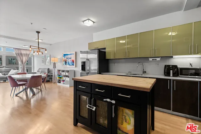 a kitchen with counter space cabinets and appliances
