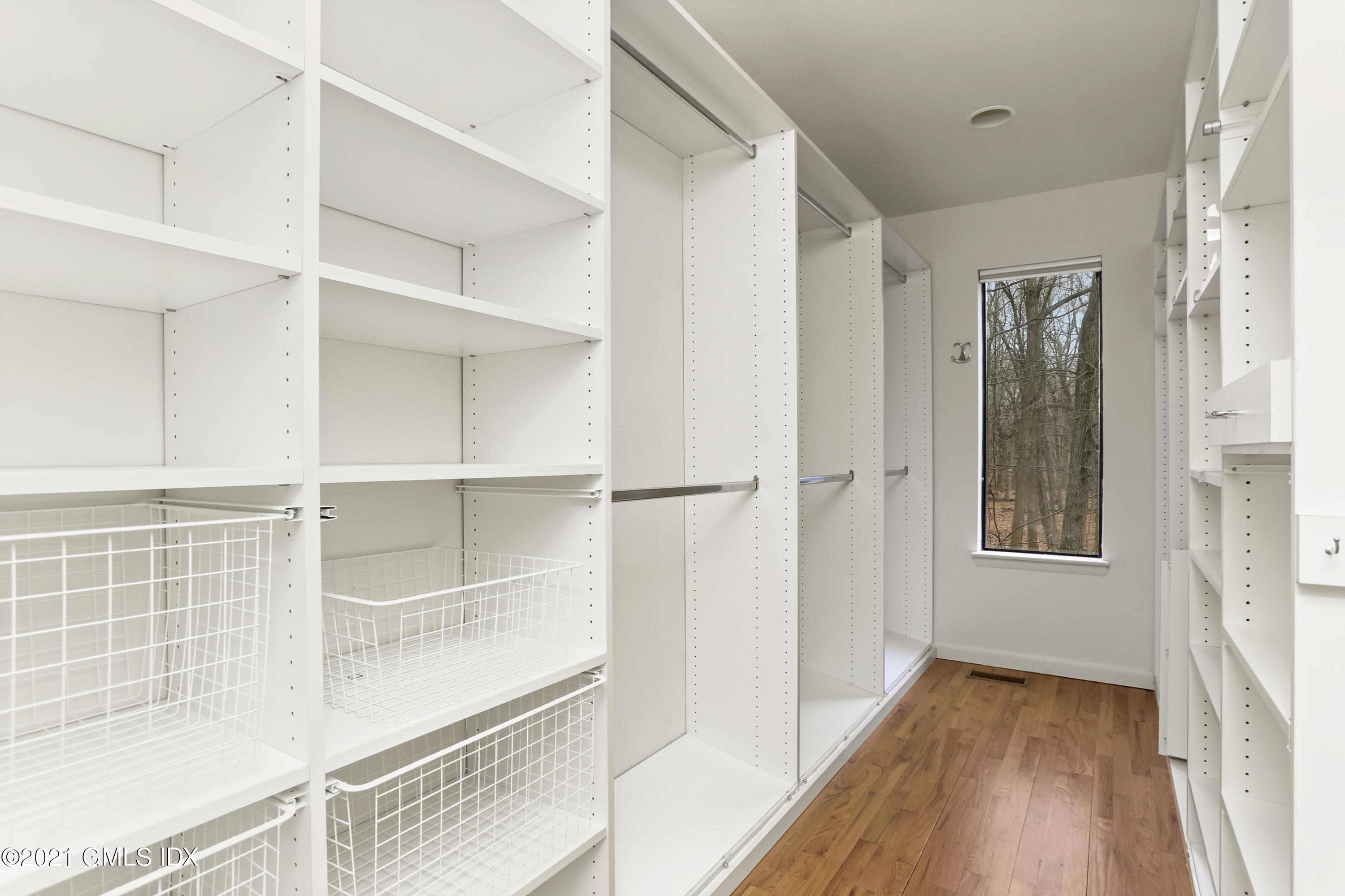 61 Sumner Road Greenwich, CT 06831 - Photo 12 of 19 a view of walk in closet with empty racks