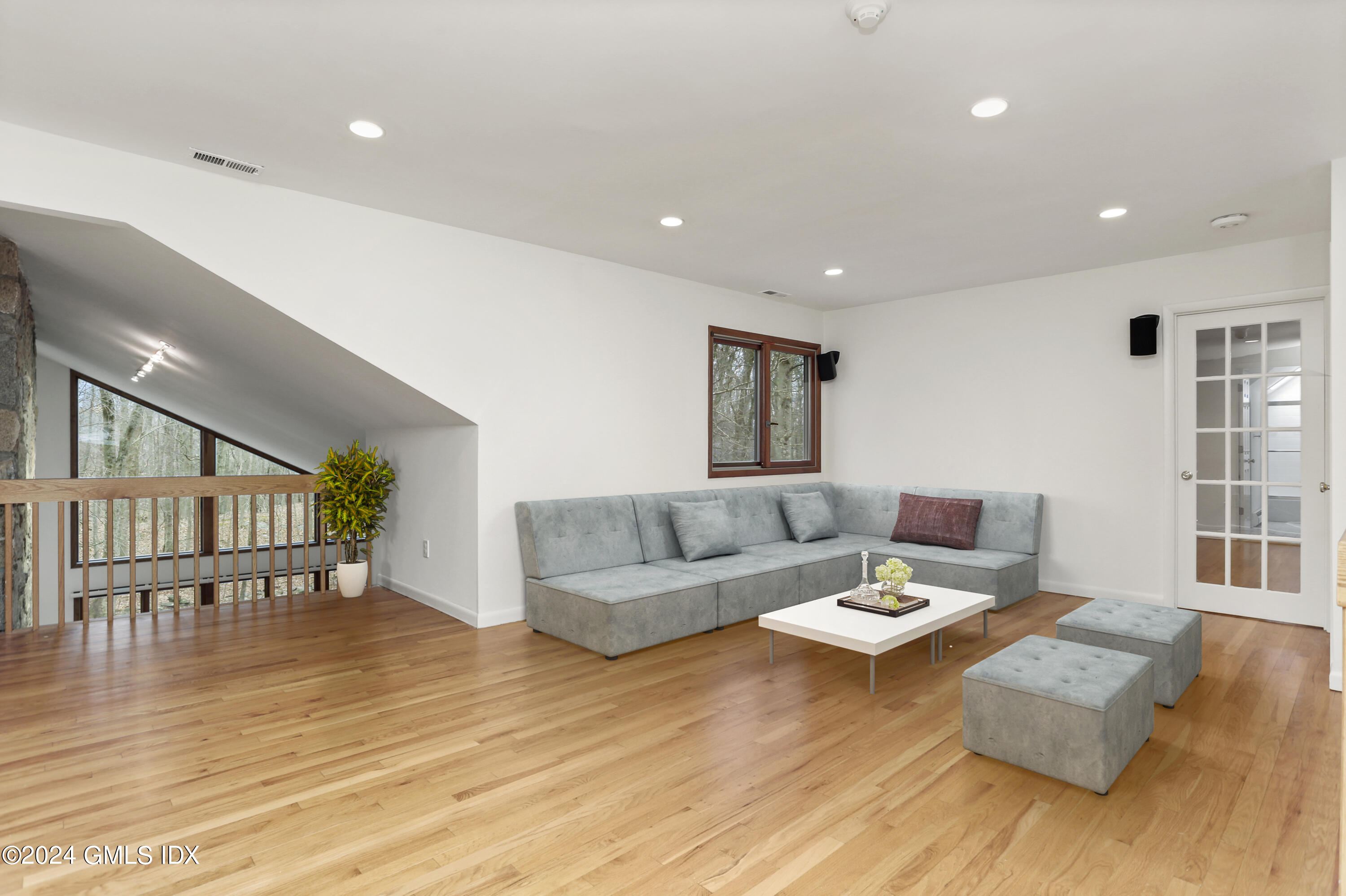 61 Sumner Road Greenwich, CT 06831 - Photo 13 of 19 a living room with furniture and a wooden floor