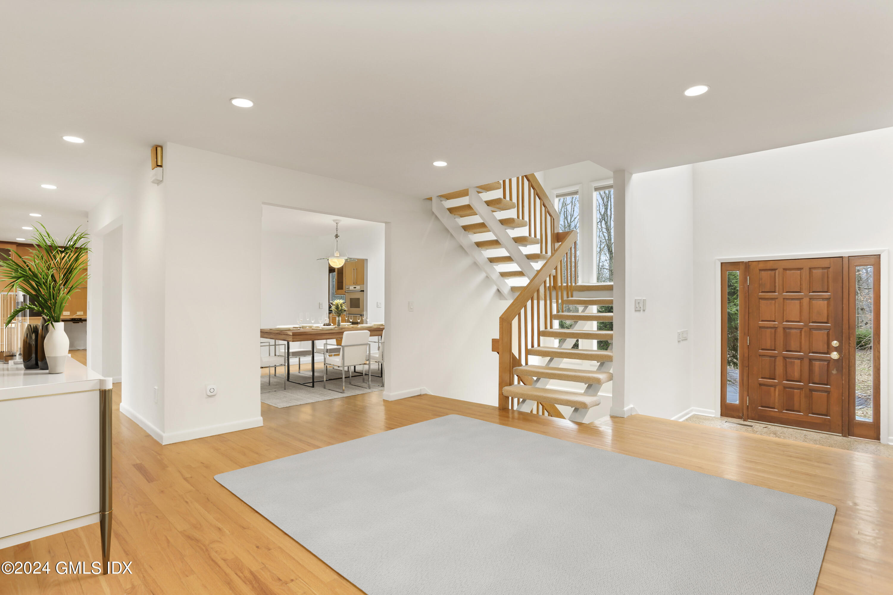 61 Sumner Road Greenwich, CT 06831 - Photo 6 of 19 a living room with furniture and wooden floor