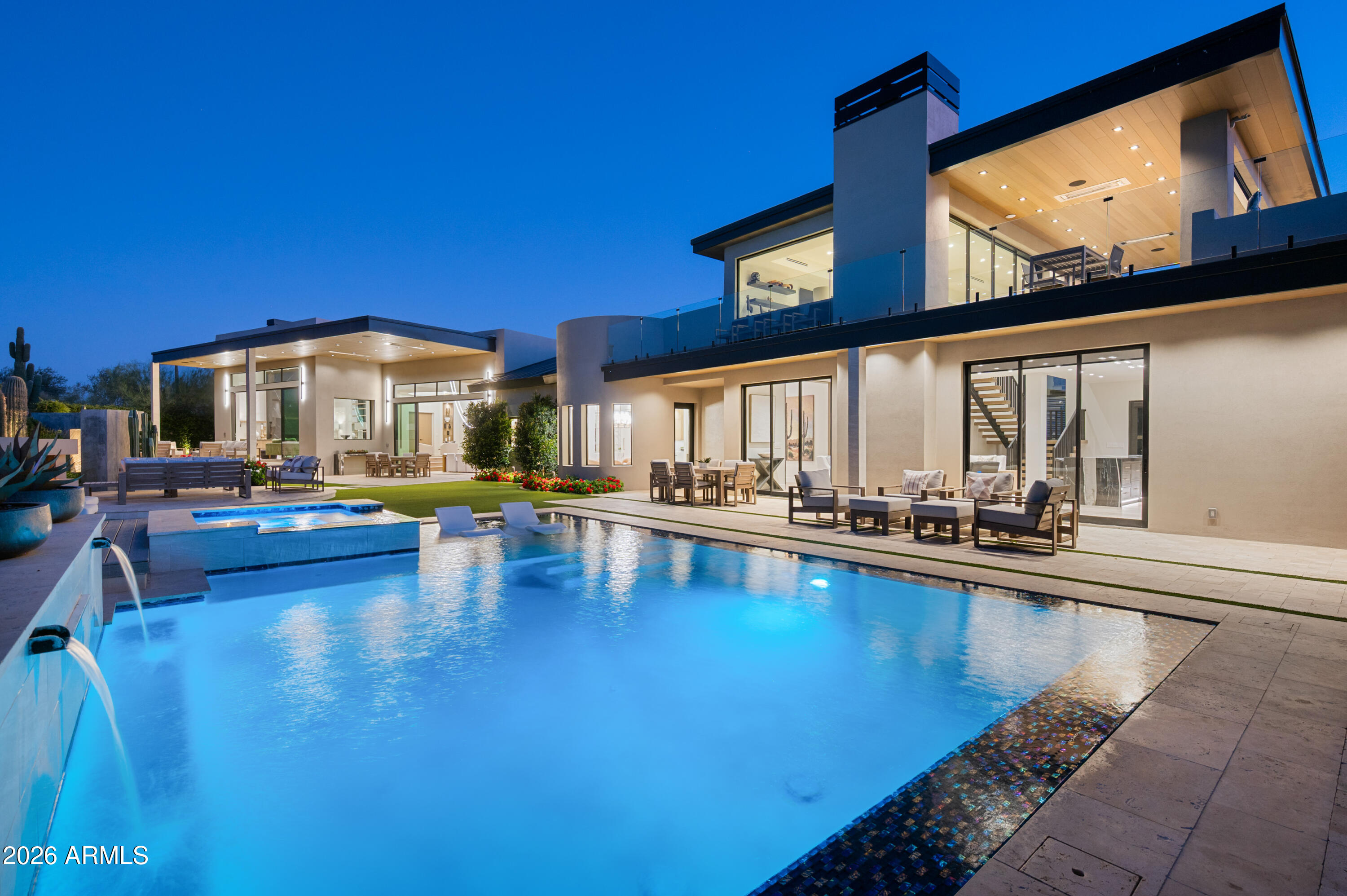 a view of swimming pool with outdoor seating