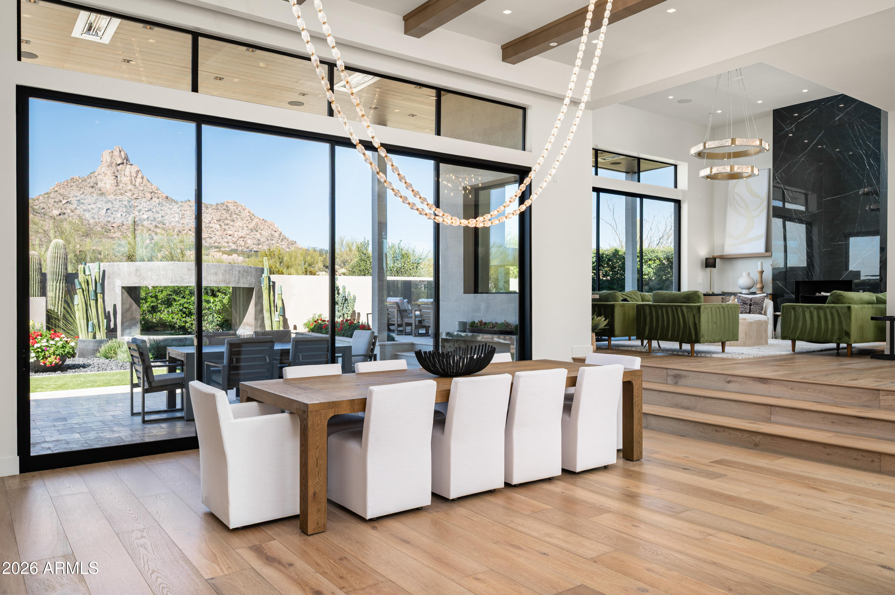 10040 East Happy Valley Road, Unit 13 Scottsdale, AZ 85255 - Photo 15 of 55 a living room with fireplace furniture and a large window