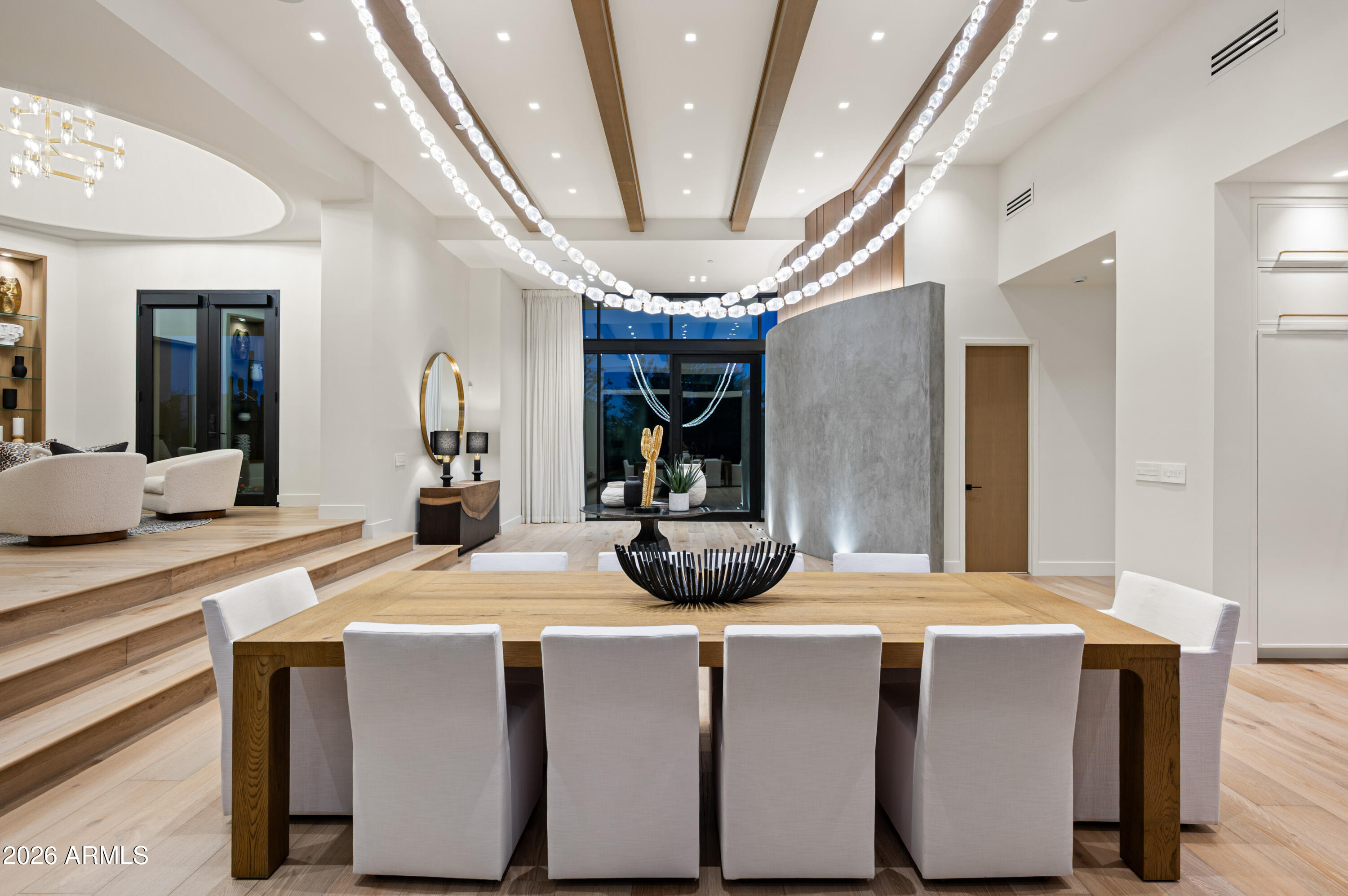 10040 East Happy Valley Road, Unit 13 Scottsdale, AZ 85255 - Photo 16 of 55 a room with kitchen island a chandelier and living room view
