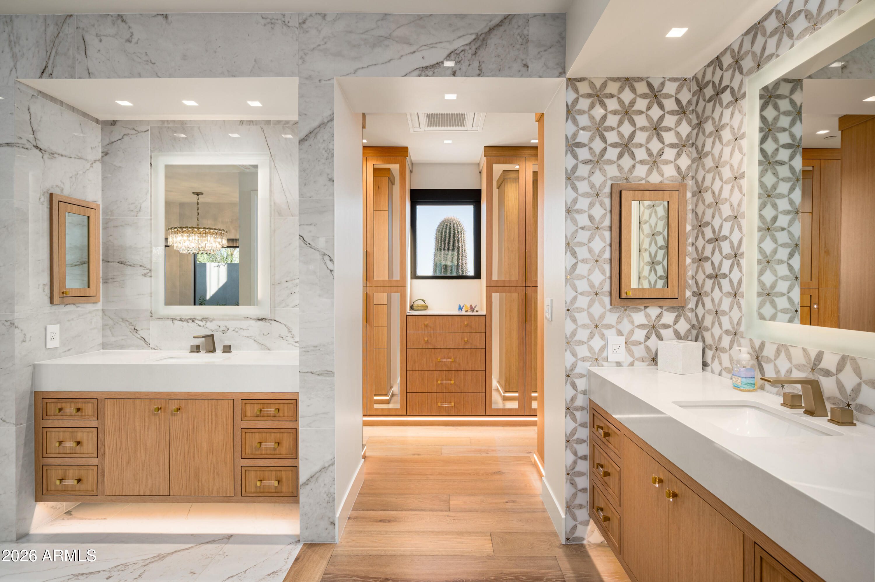 10040 East Happy Valley Road, Unit 13 Scottsdale, AZ 85255 - Photo 21 of 55 a spacious bathroom with a double vanity sink a large mirror and a shower