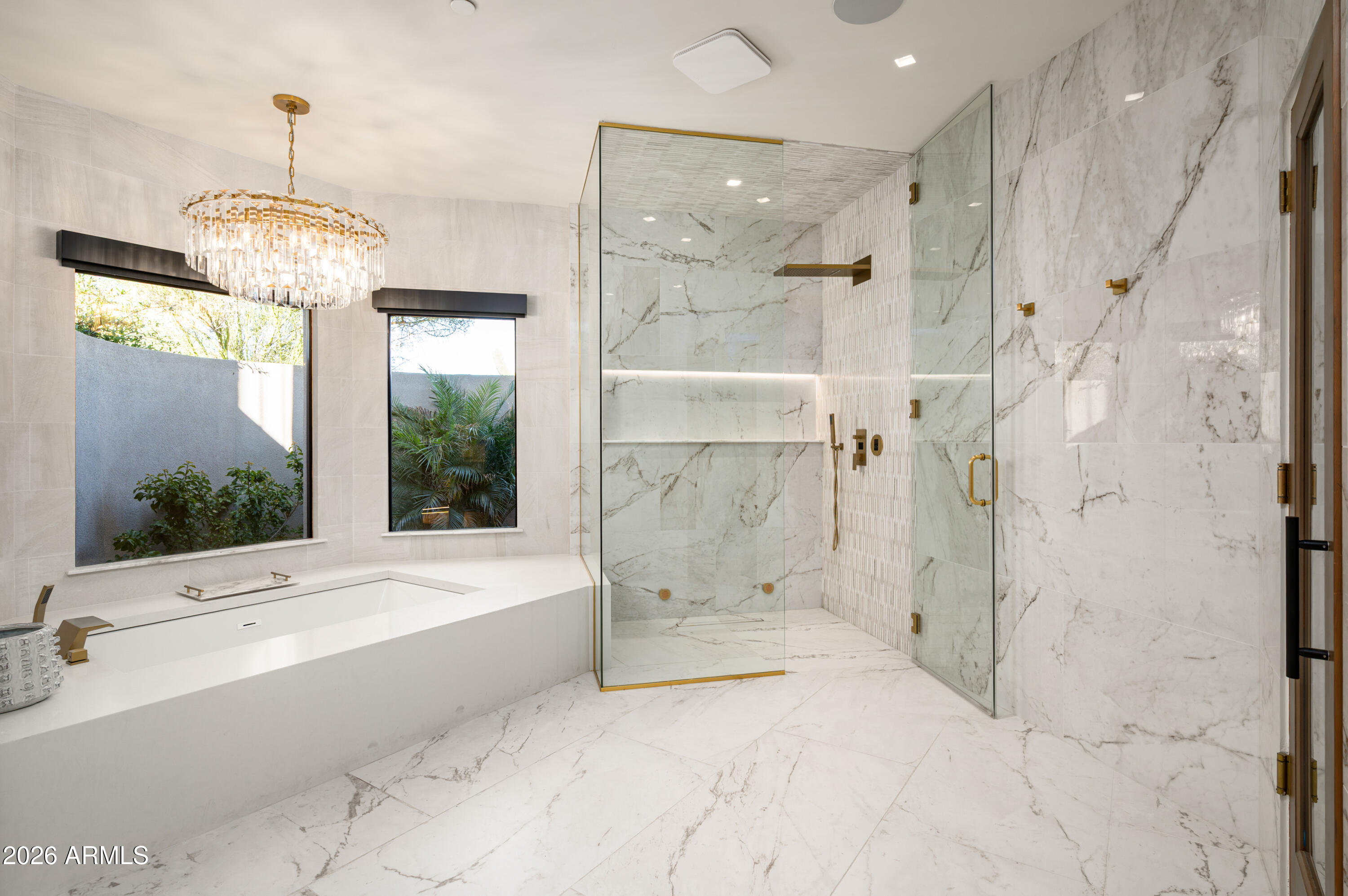 10040 East Happy Valley Road, Unit 13 Scottsdale, AZ 85255 - Photo 22 of 55 a bathroom with a tub shower and sink
