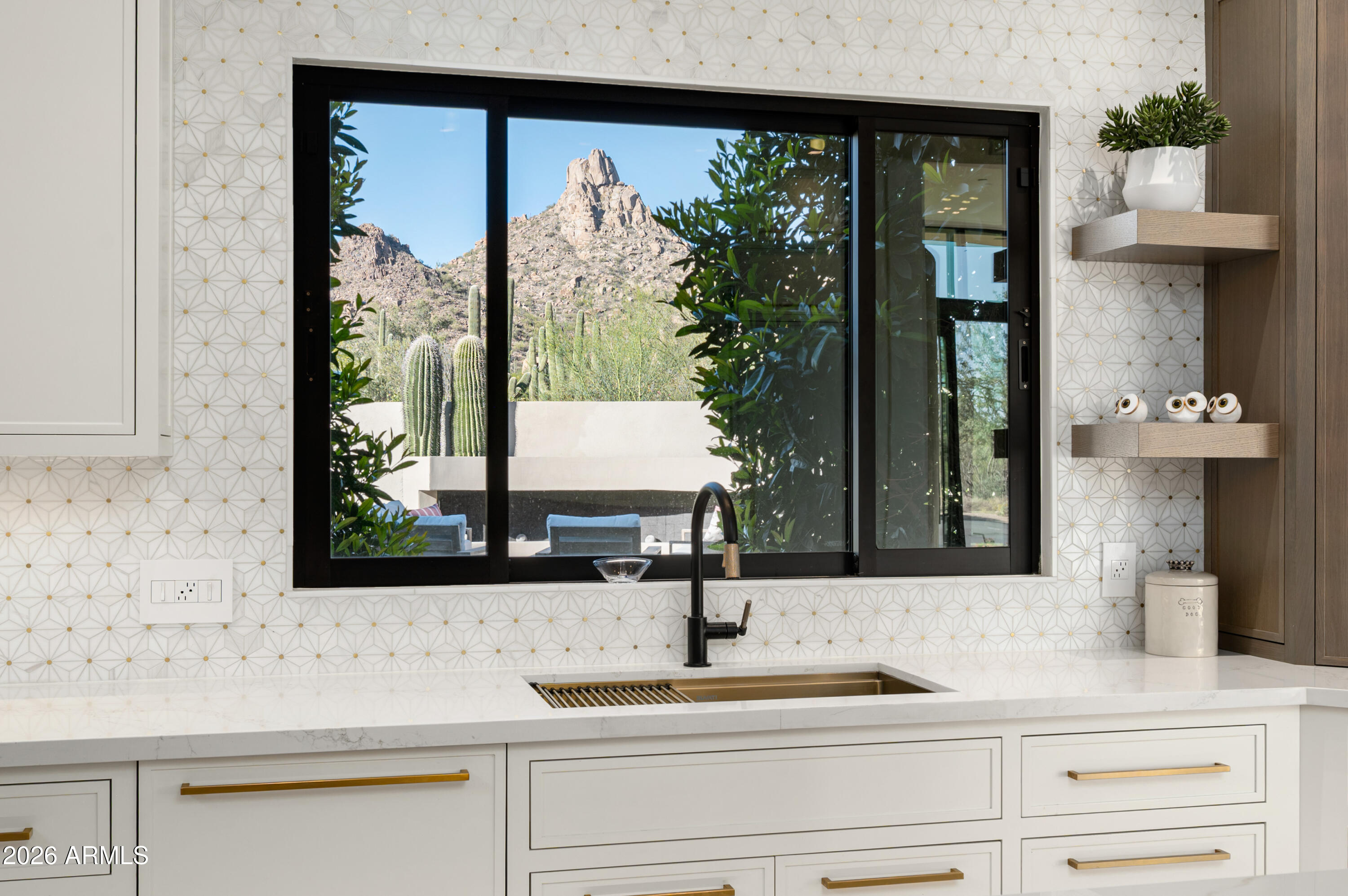10040 East Happy Valley Road, Unit 13 Scottsdale, AZ 85255 - Photo 24 of 55 a bathroom with a sink and a mirror