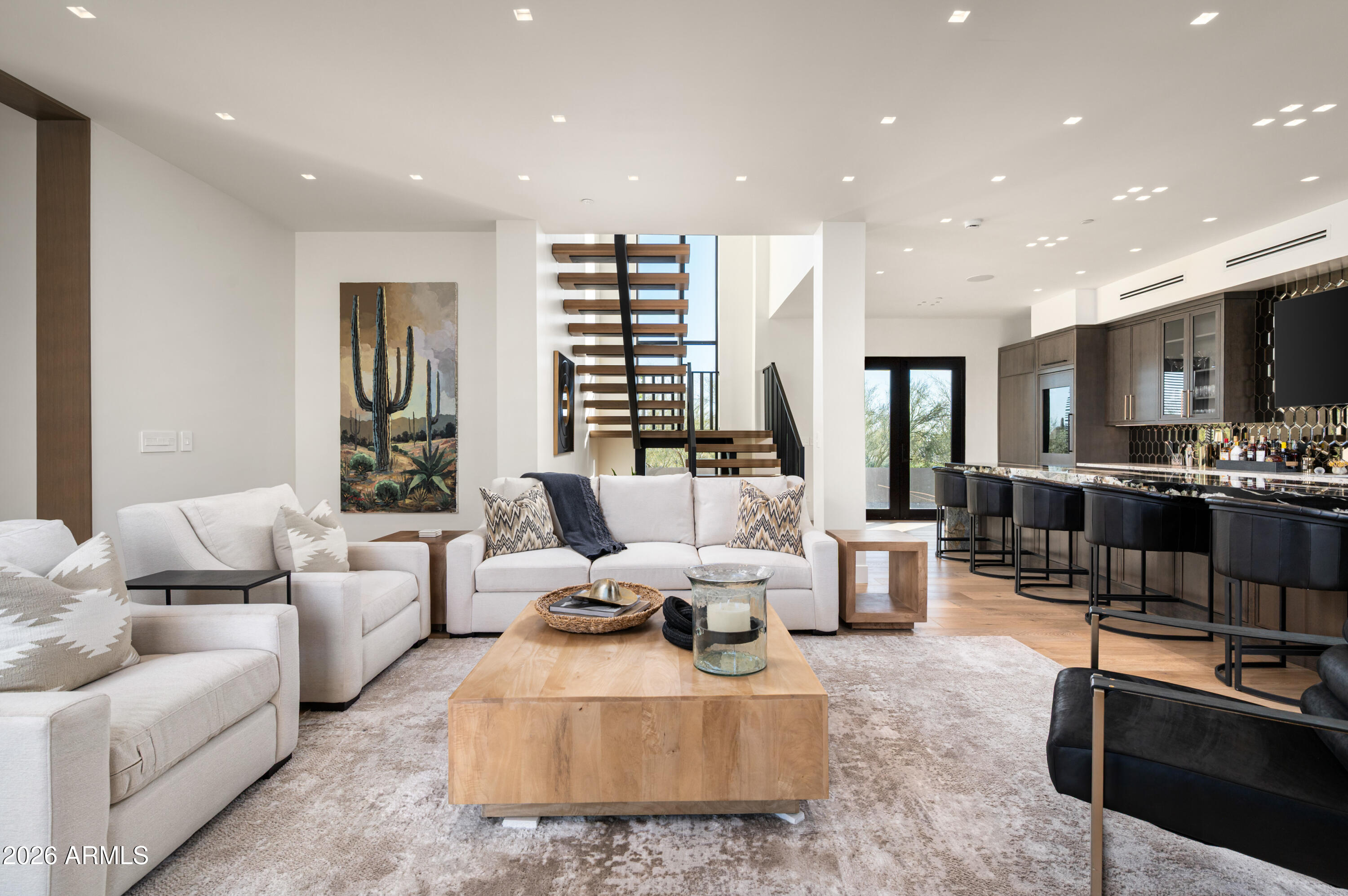 10040 East Happy Valley Road, Unit 13 Scottsdale, AZ 85255 - Photo 30 of 55 a living room with furniture kitchen view and a large window