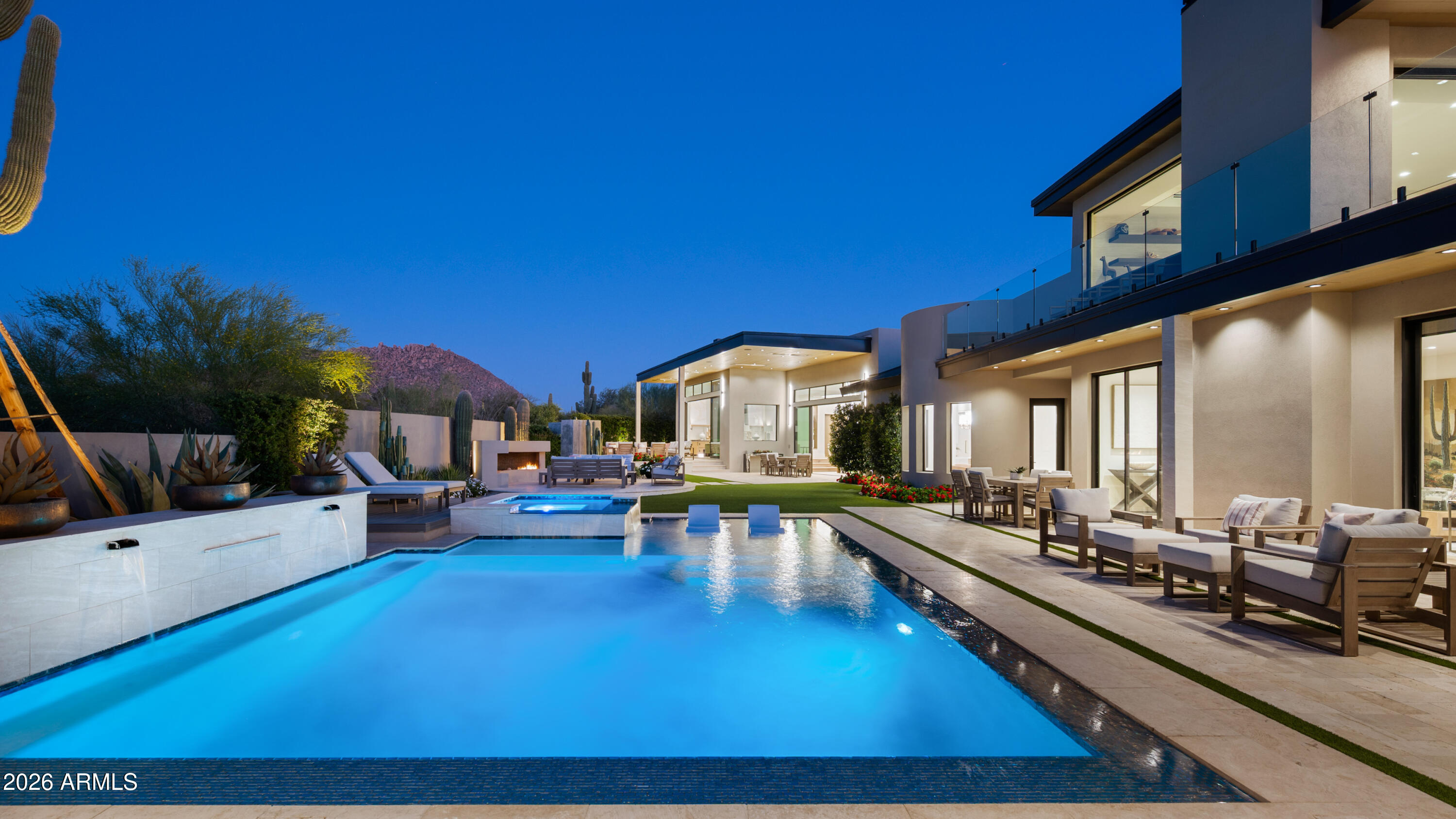10040 East Happy Valley Road, Unit 13 Scottsdale, AZ 85255 - Photo 40 of 55 a living room with furniture pool table and chairs
