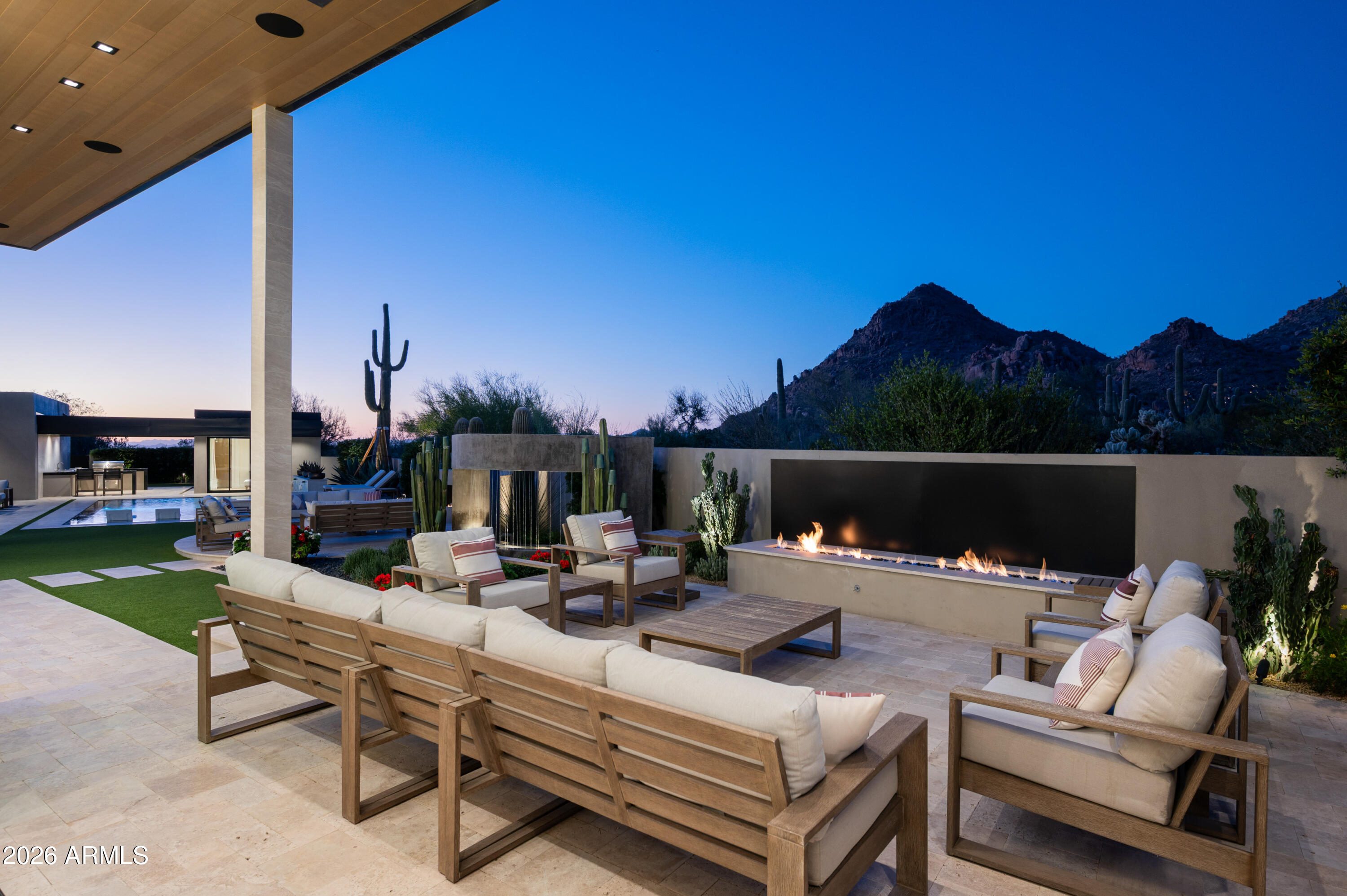 10040 East Happy Valley Road, Unit 13 Scottsdale, AZ 85255 - Photo 41 of 55 a outdoor living space with furniture and city view