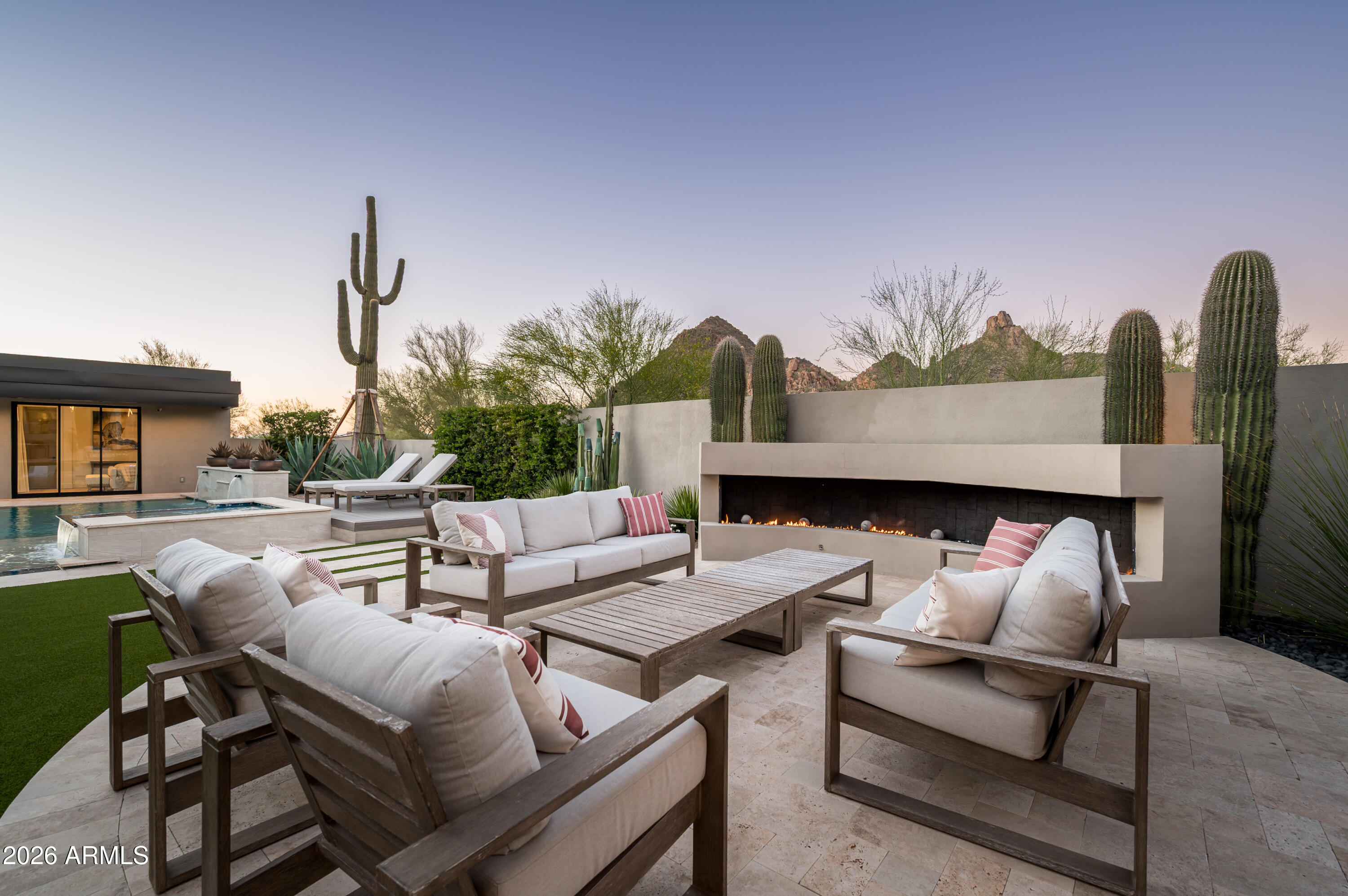 10040 East Happy Valley Road, Unit 13 Scottsdale, AZ 85255 - Photo 47 of 55 a outdoor space with patio couch and a potted plant