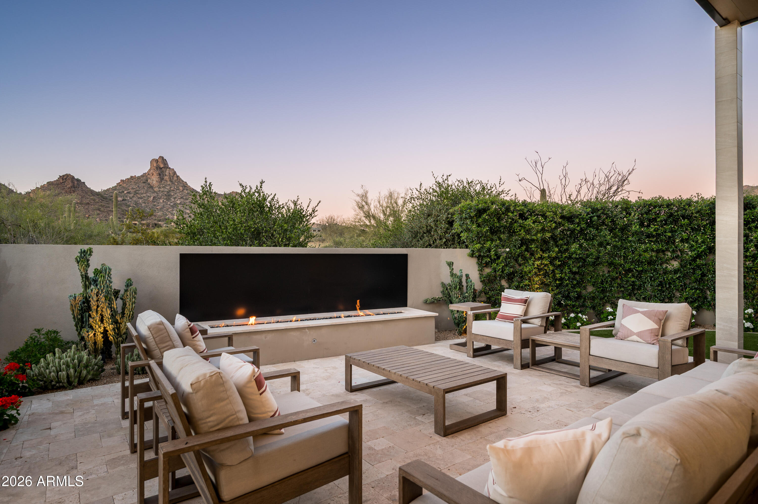 10040 East Happy Valley Road, Unit 13 Scottsdale, AZ 85255 - Photo 48 of 55 a terrace with outdoor seating and a garden