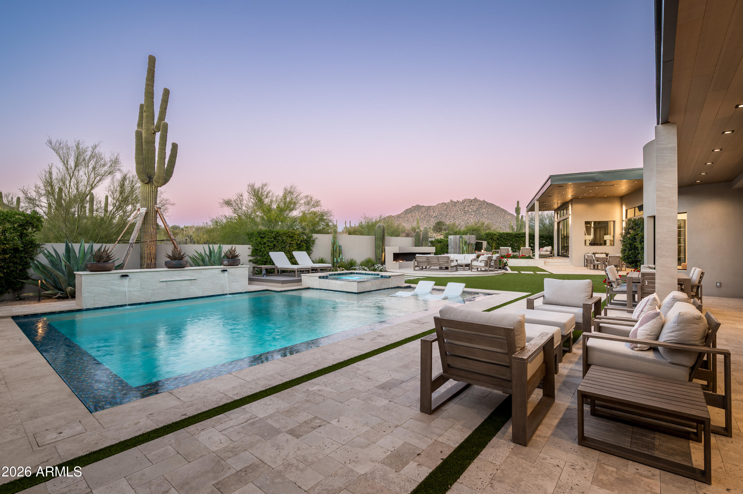 10040 East Happy Valley Road, Unit 13 Scottsdale, AZ 85255 - Photo 49 of 55 a view of swimming pool with outdoor seating and a potted plant