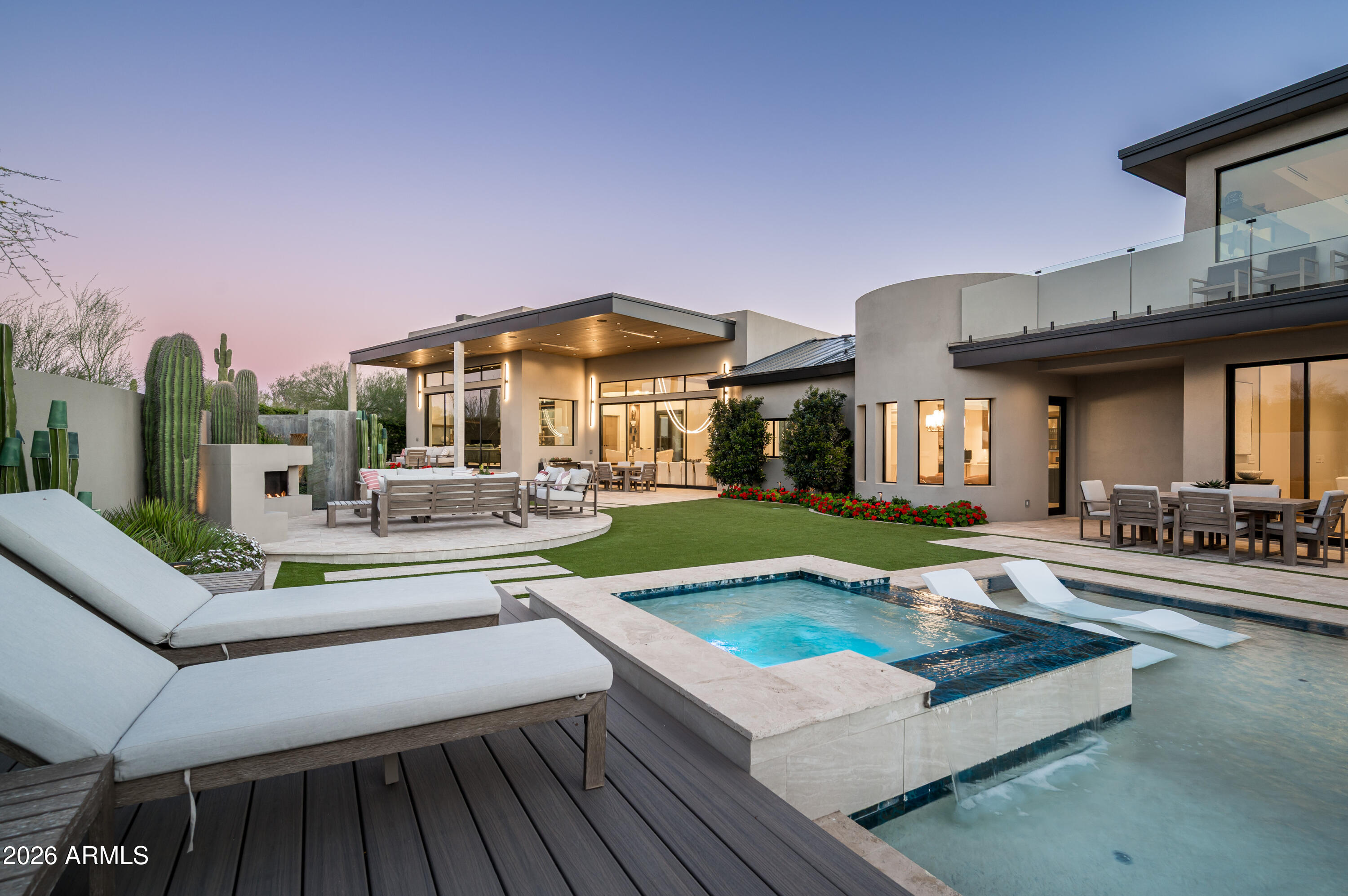 10040 East Happy Valley Road, Unit 13 Scottsdale, AZ 85255 - Photo 50 of 55 a view of a house with swimming pool and sitting area