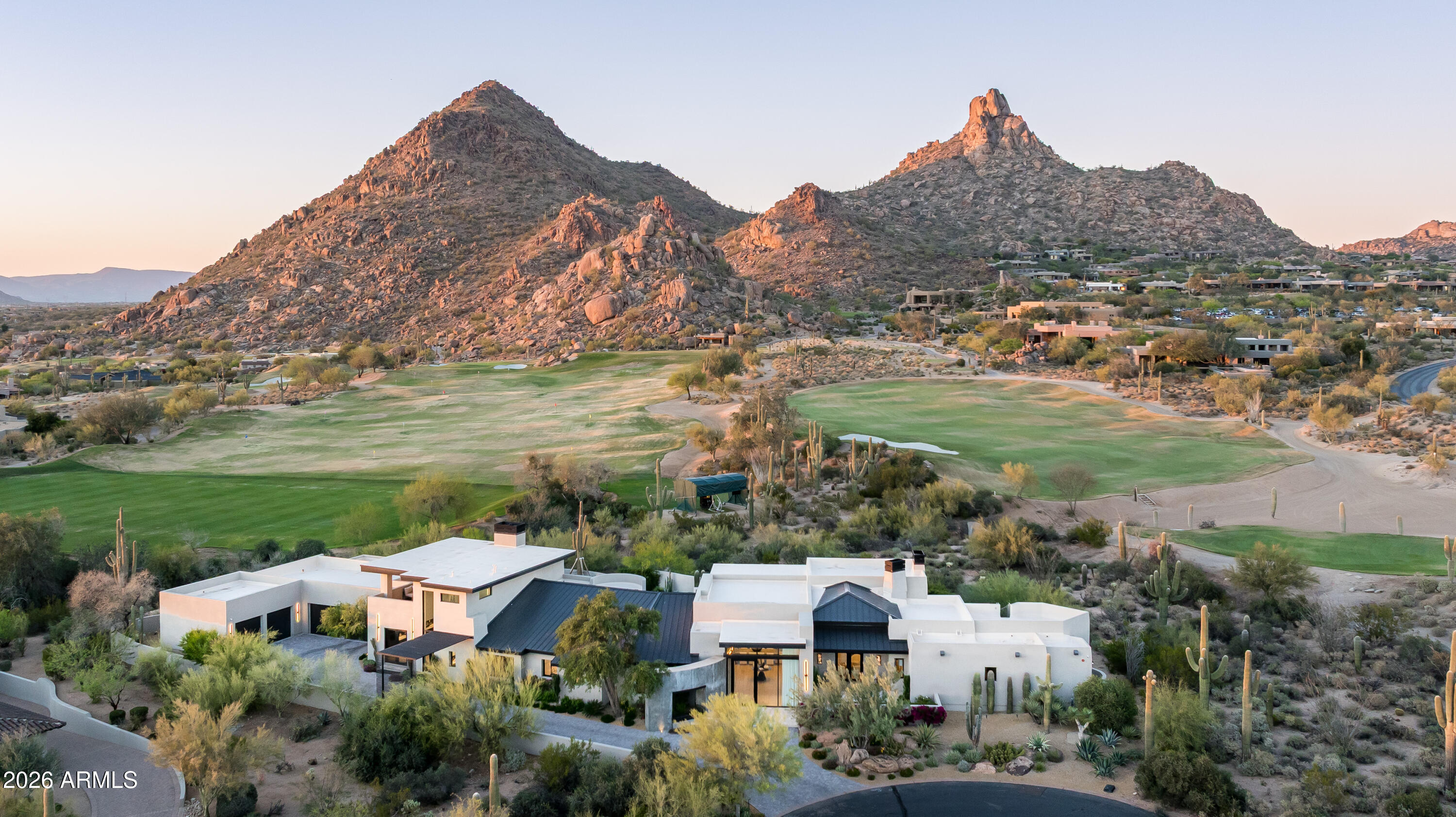 10040 East Happy Valley Road, Unit 13 Scottsdale, AZ 85255 - Photo 9 of 55 a view of a city with mountains in the background