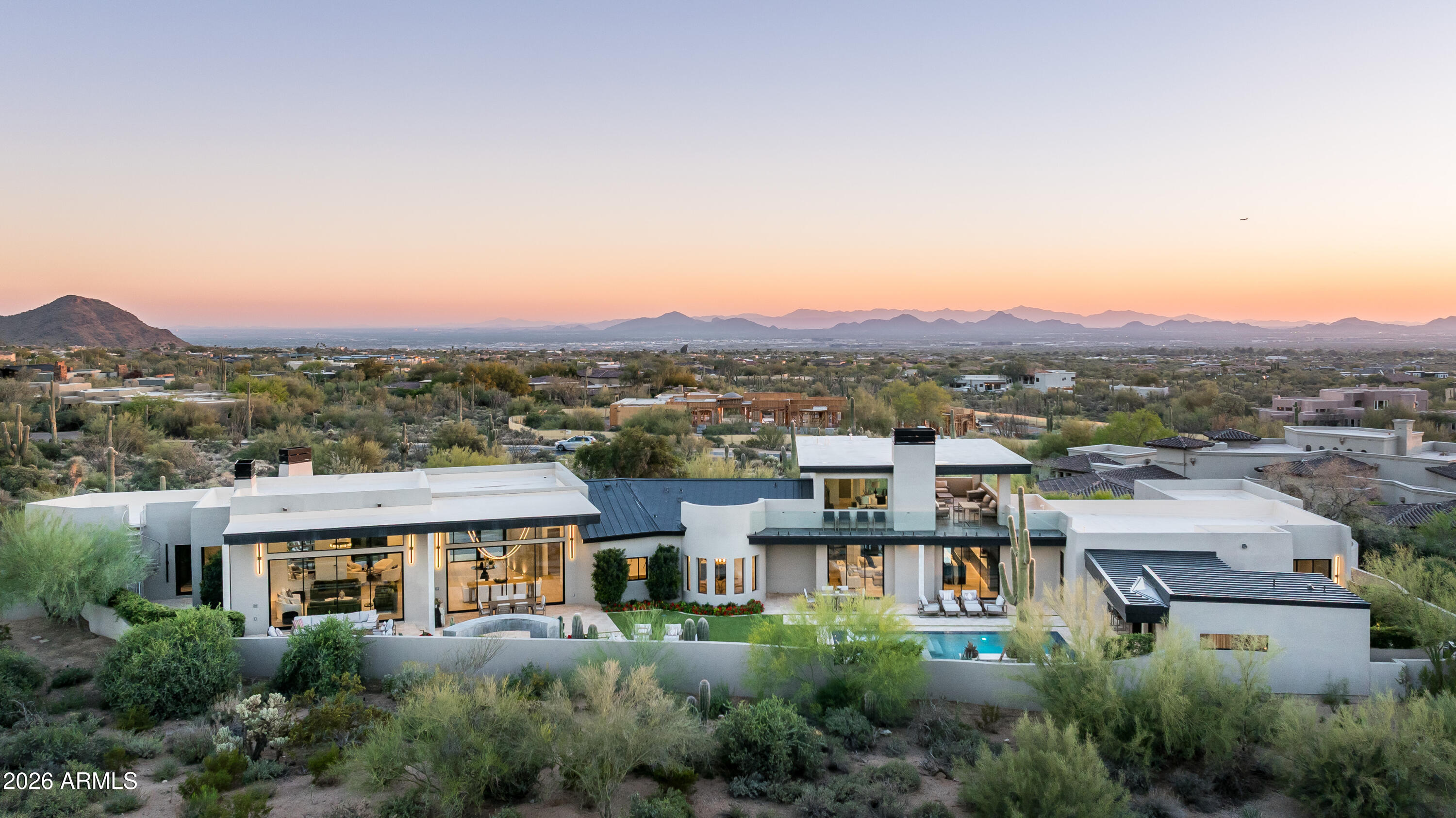 10040 East Happy Valley Road, Unit 13 Scottsdale, AZ 85255 - Photo 10 of 55 an aerial view of residential houses with a city view