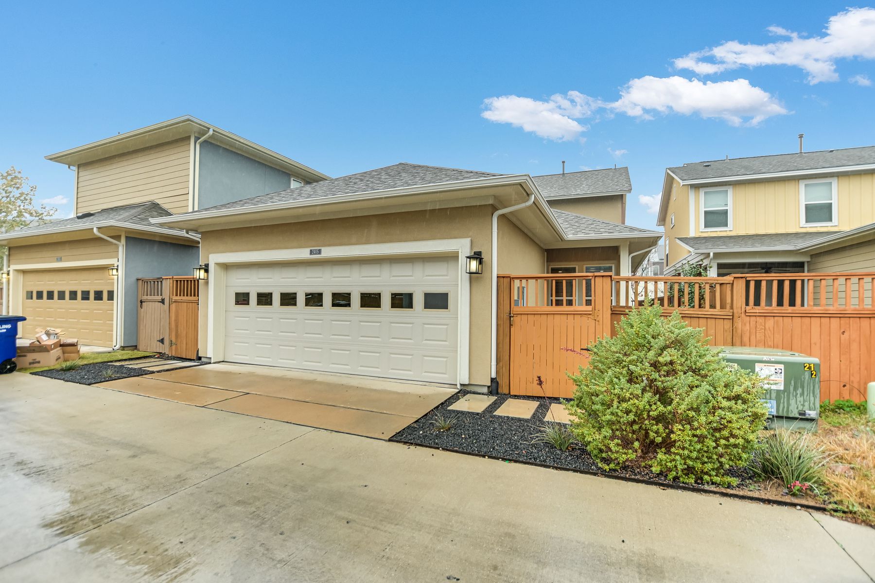 2405 Moreno Street Austin, TX 78723 - Photo 20 of 20 Two-car garage accessed by the alleyway, along with a pedestrian gate for easy access to walkable Mueller amenities.