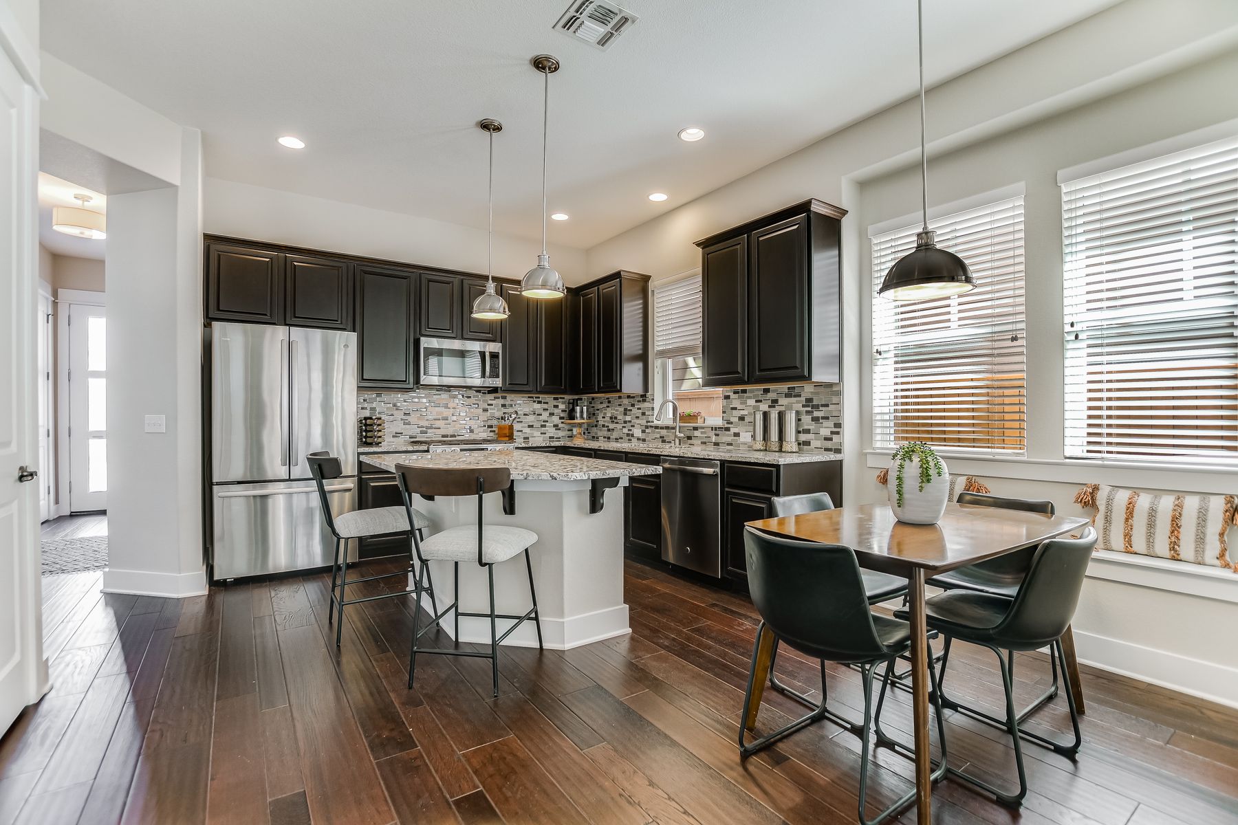 2405 Moreno Street Austin, TX 78723 - Photo 8 of 20 A spacious, open, and light-filled kitchen is perfect for entertaining.
