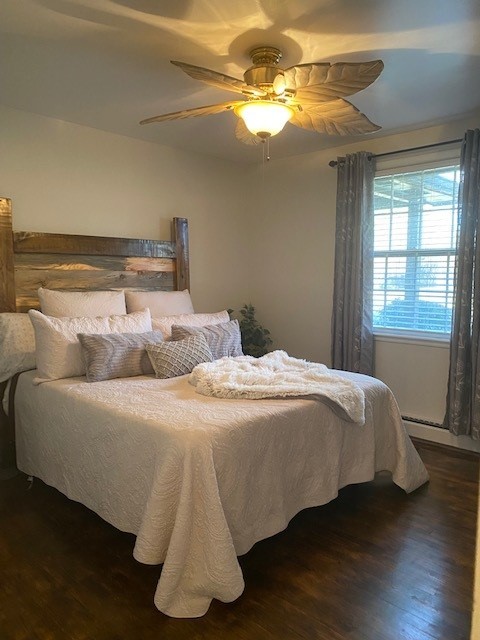 917 Vanderbilt Road Mount Juliet, TN 37122 - Photo 5 of 9 a bedroom with a bed and a chandelier