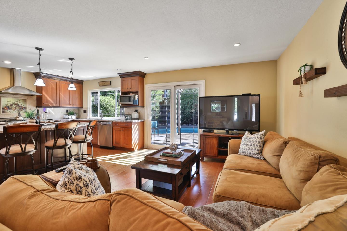 2314 Oak Flat Road San Jose, CA 95131 - Photo 13 of 36 a living room with furniture kitchen view and a large window