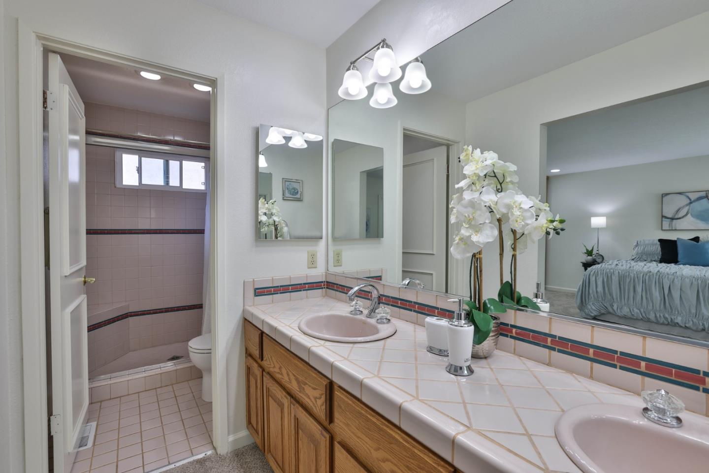 2314 Oak Flat Road San Jose, CA 95131 - Photo 22 of 36 a bathroom with a sink double vanity and a mirror