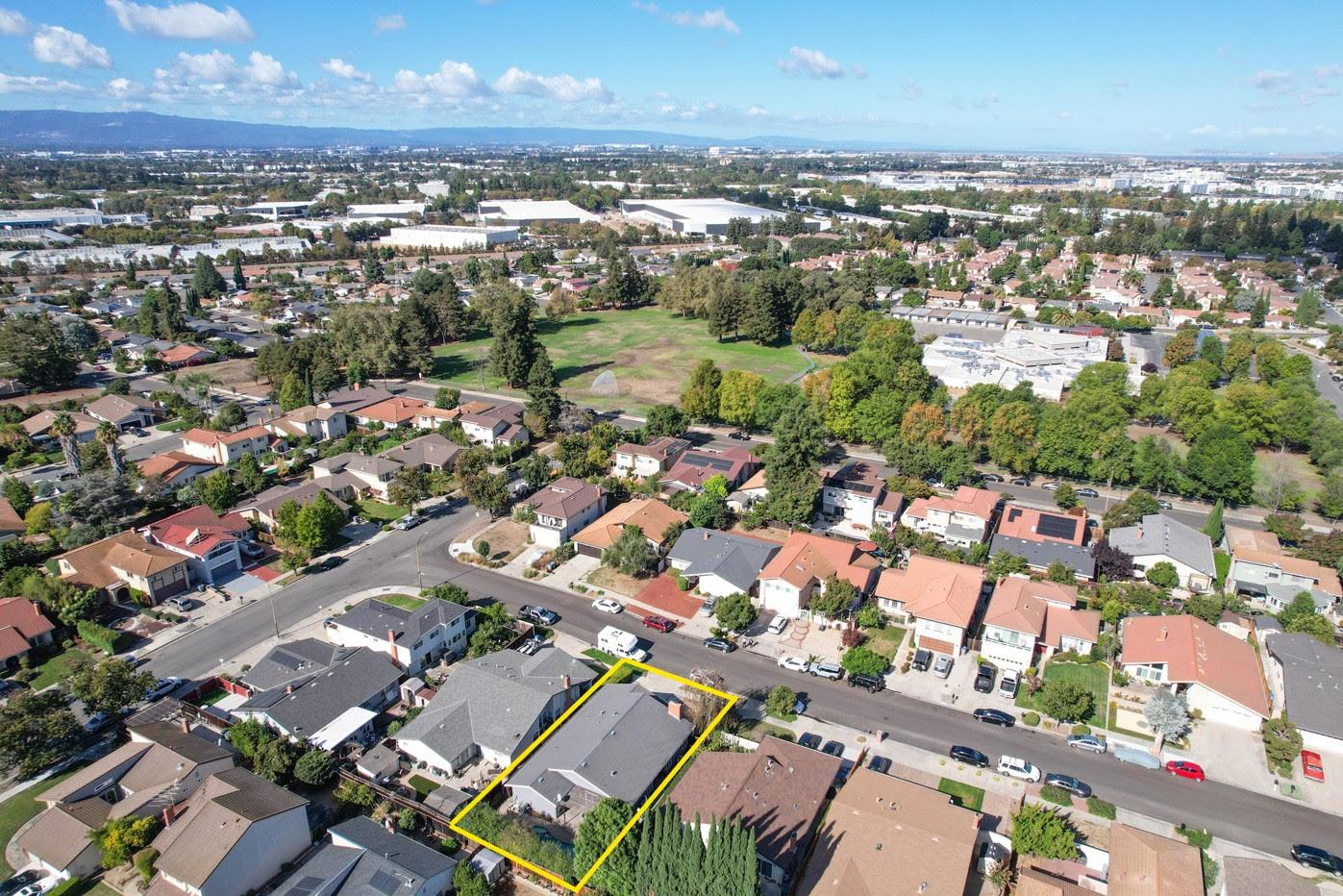 2314 Oak Flat Road San Jose, CA 95131 - Photo 33 of 36 an aerial view of a city with lots of residential buildings and ocean view in back