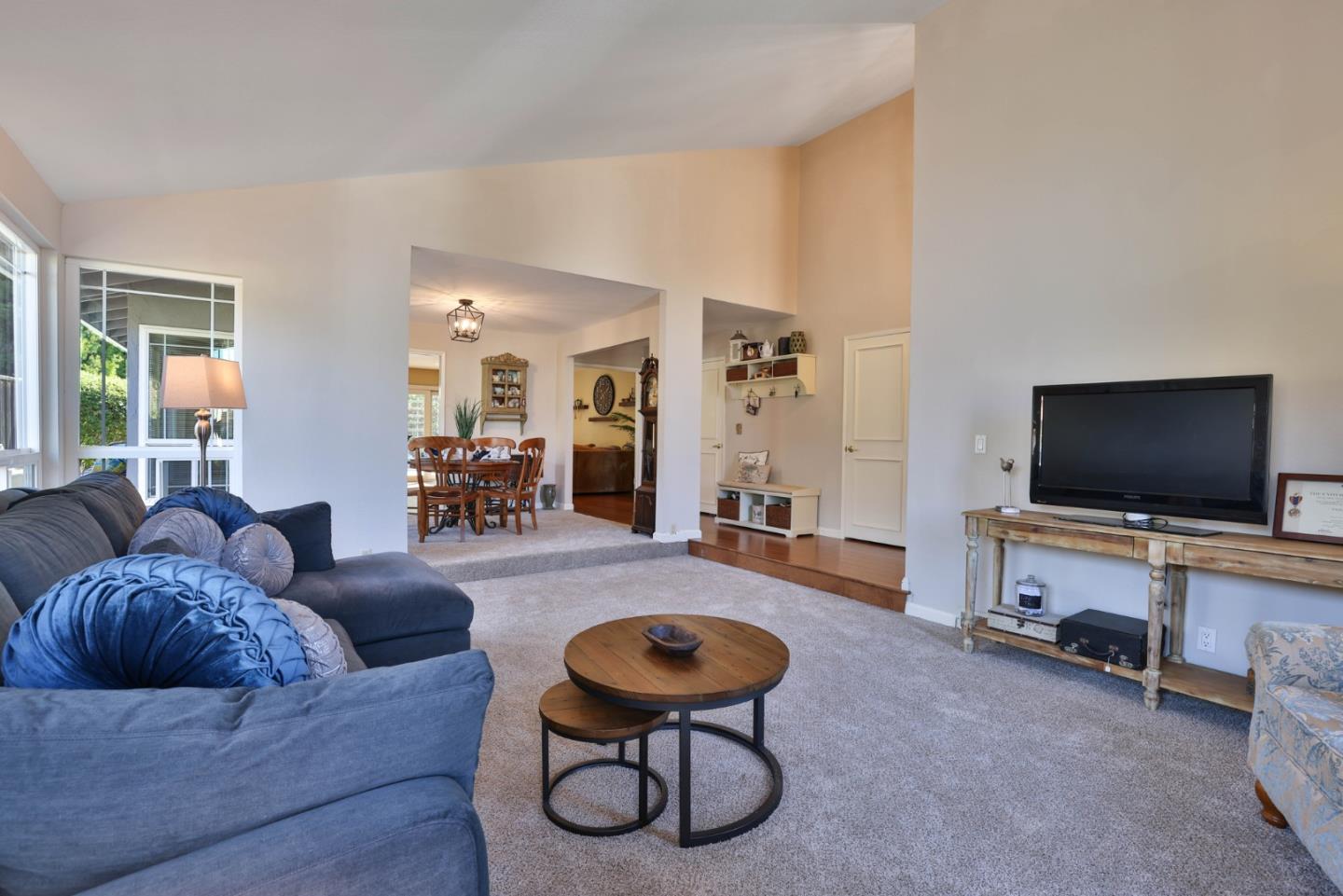 2314 Oak Flat Road San Jose, CA 95131 - Photo 6 of 36 a living room with furniture and a flat screen tv