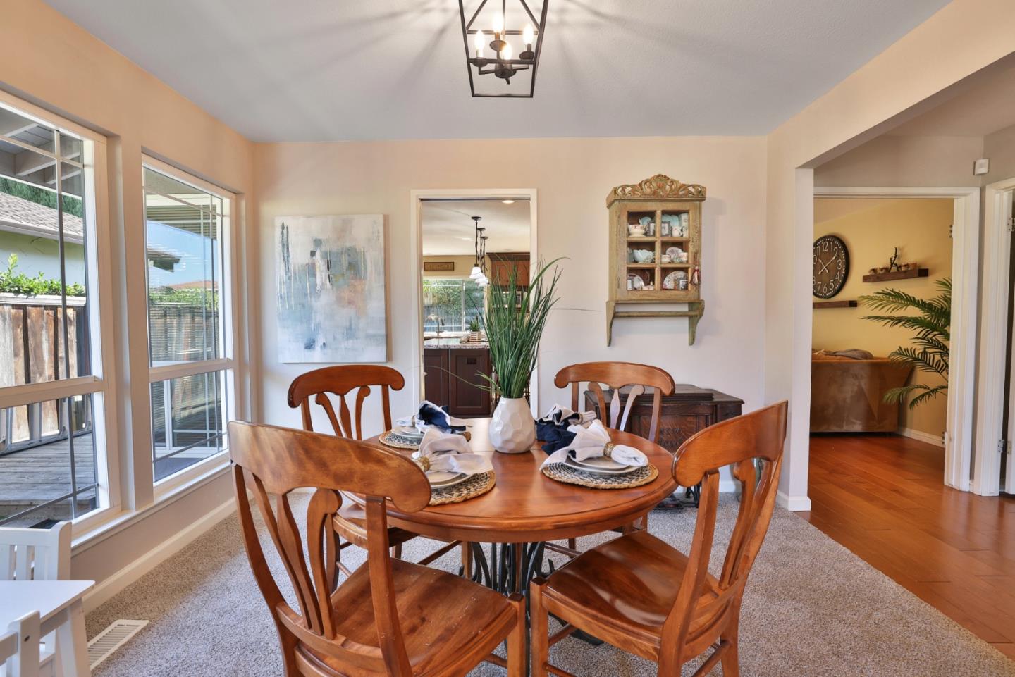 2314 Oak Flat Road San Jose, CA 95131 - Photo 7 of 36 a view of a dining room with furniture window and wooden floor