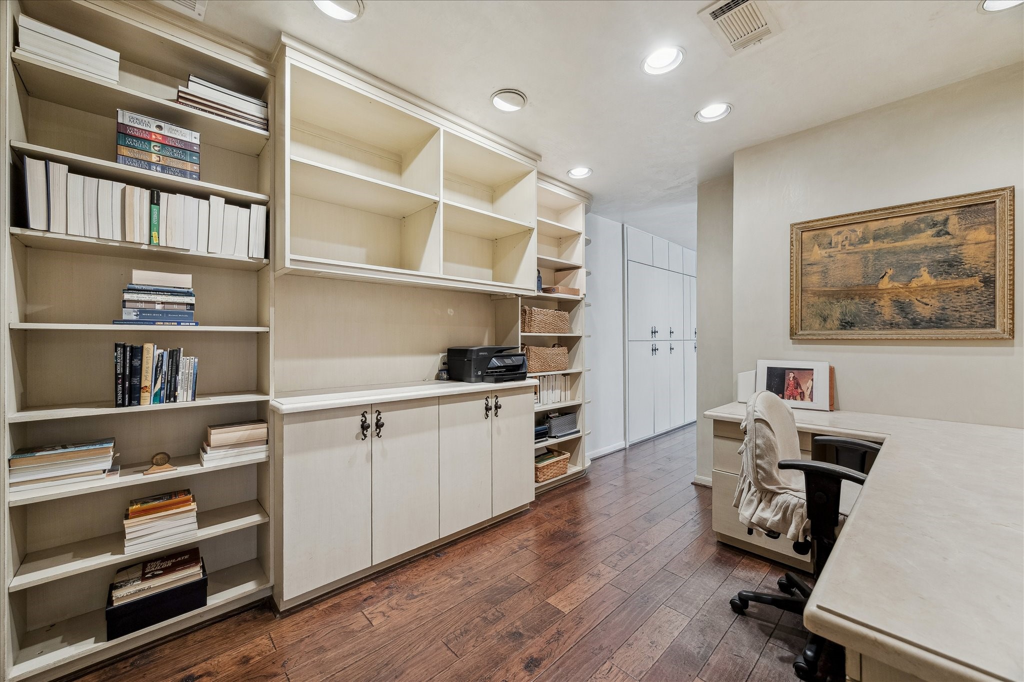 230 Gessner Road Houston, TX 77024 - Photo 19 of 31 a room with cabinets and wooden floor