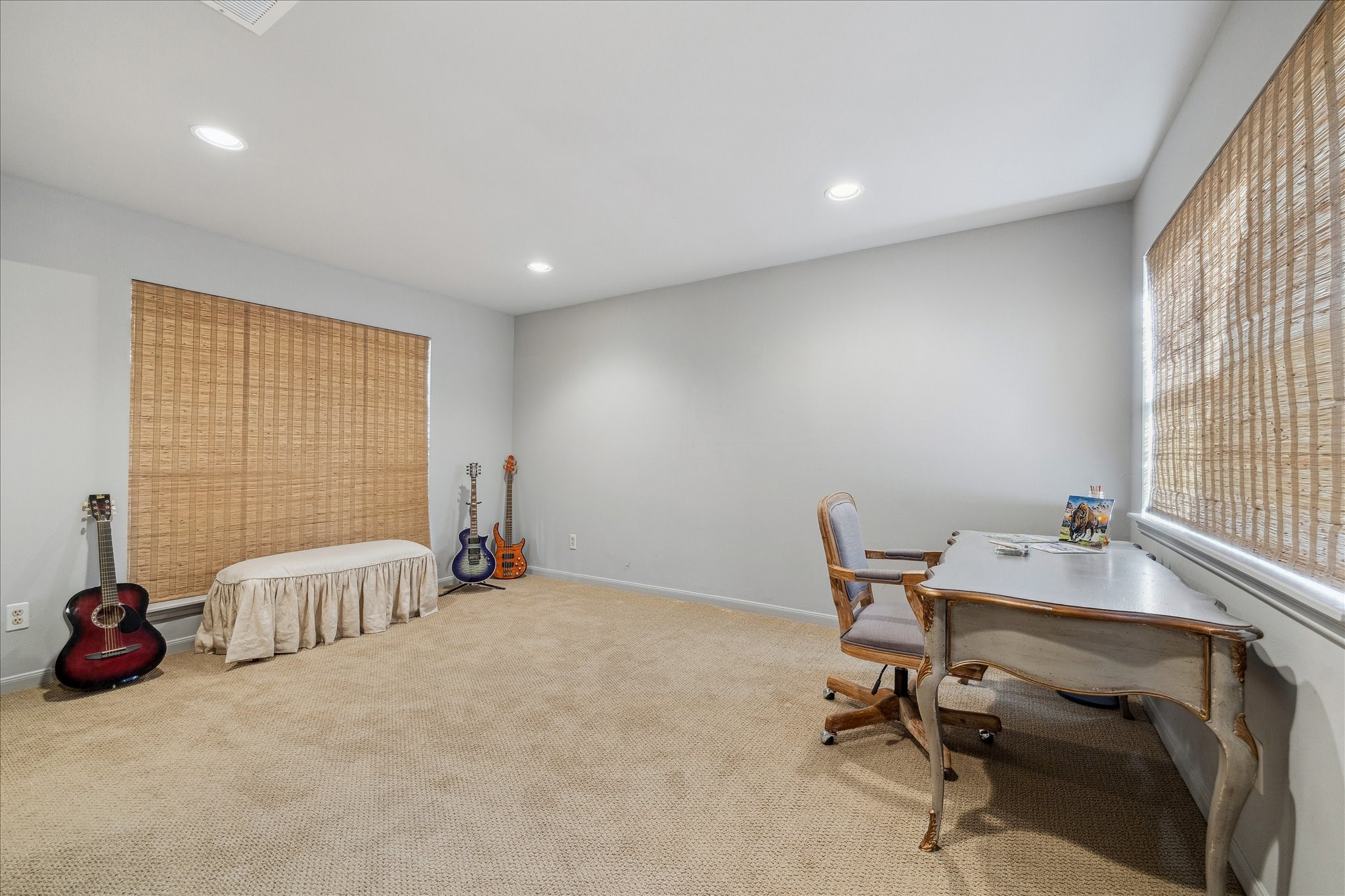 230 Gessner Road Houston, TX 77024 - Photo 24 of 31 a view of a workspace with furniture and a window
