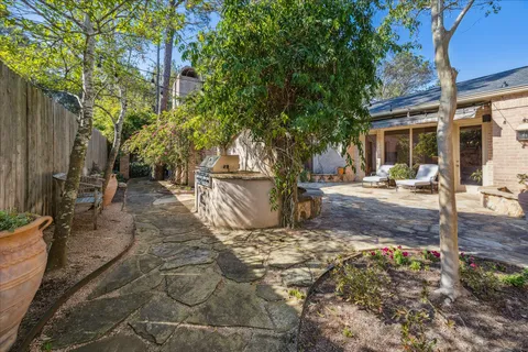 a backyard of a house with lots of green space