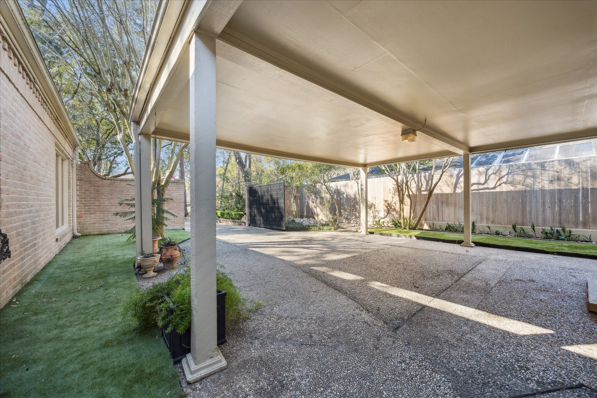 230 Gessner Road Houston, TX 77024 - Photo 30 of 31 a backyard of a house with lots of green space