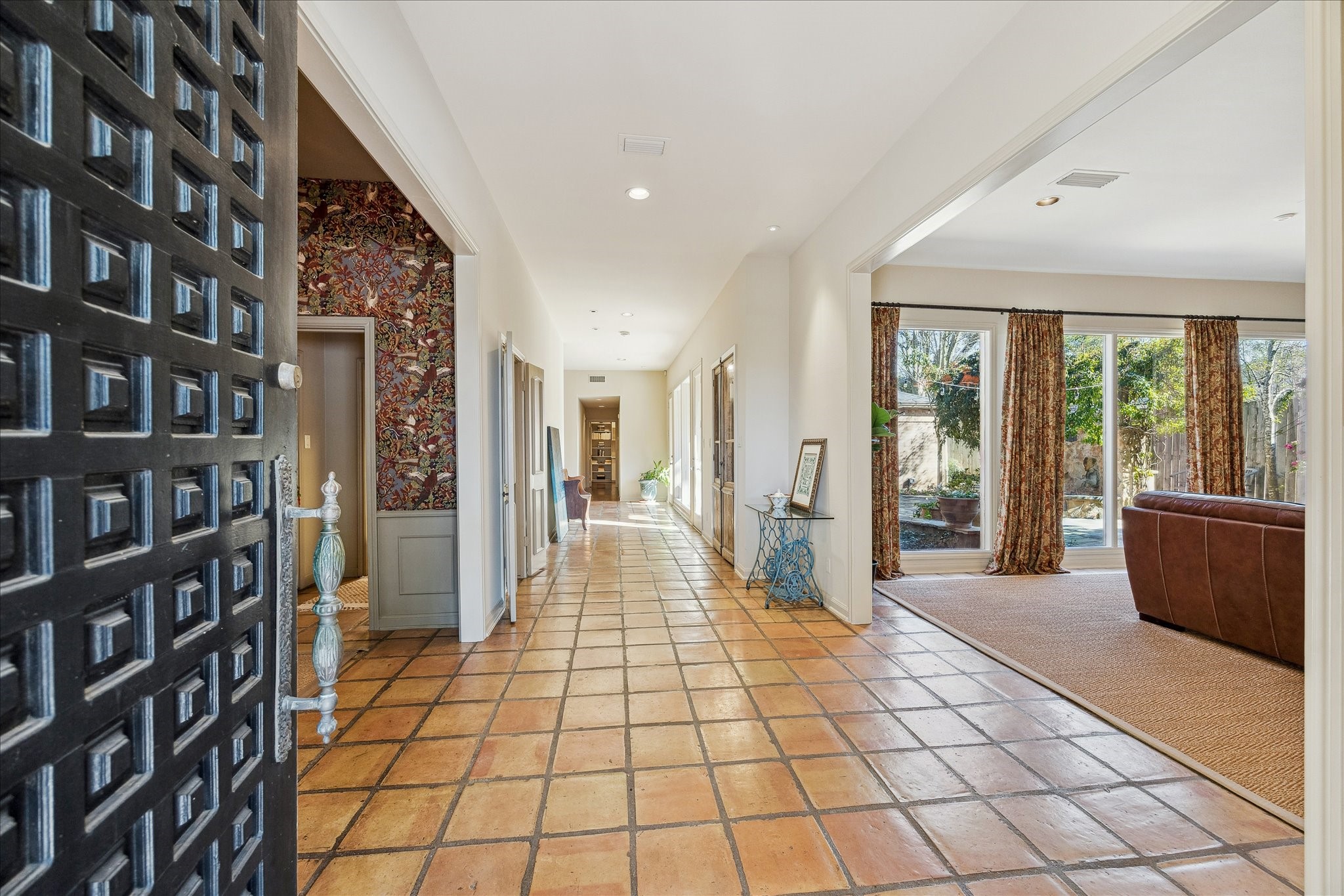 230 Gessner Road Houston, TX 77024 - Photo 3 of 31 a hallway with windows