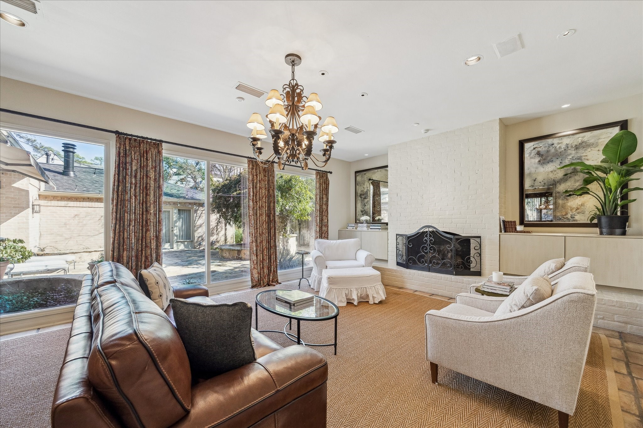 230 Gessner Road Houston, TX 77024 - Photo 5 of 31 a living room with furniture and a large window