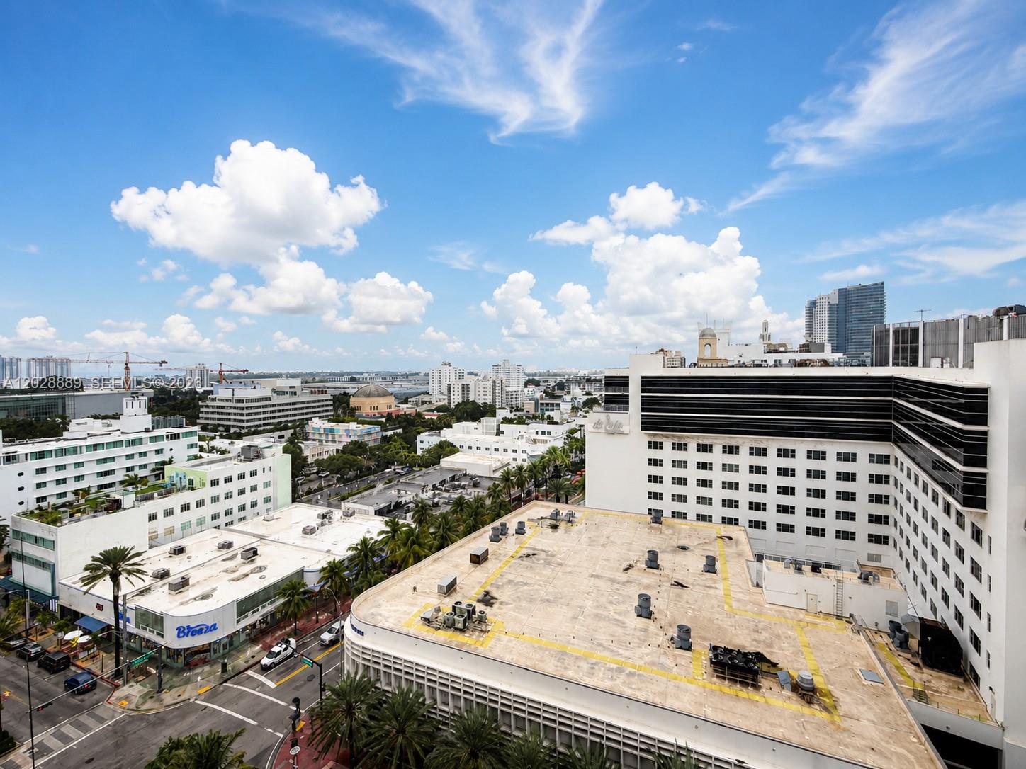 100 Lincoln Road, Unit 1504 Miami Beach, FL 33139 - Photo 16 of 17 a view of a roof deck with furniture