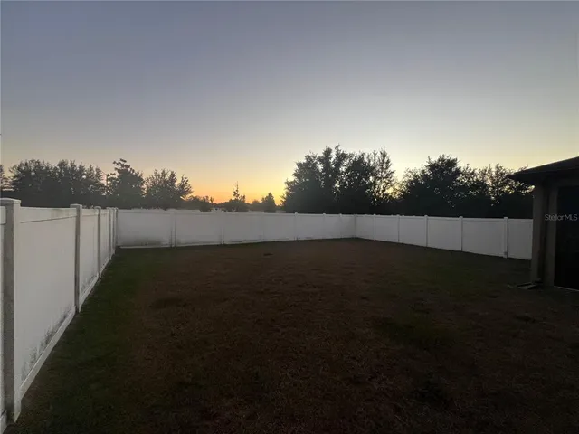 a view of outdoor space and yard