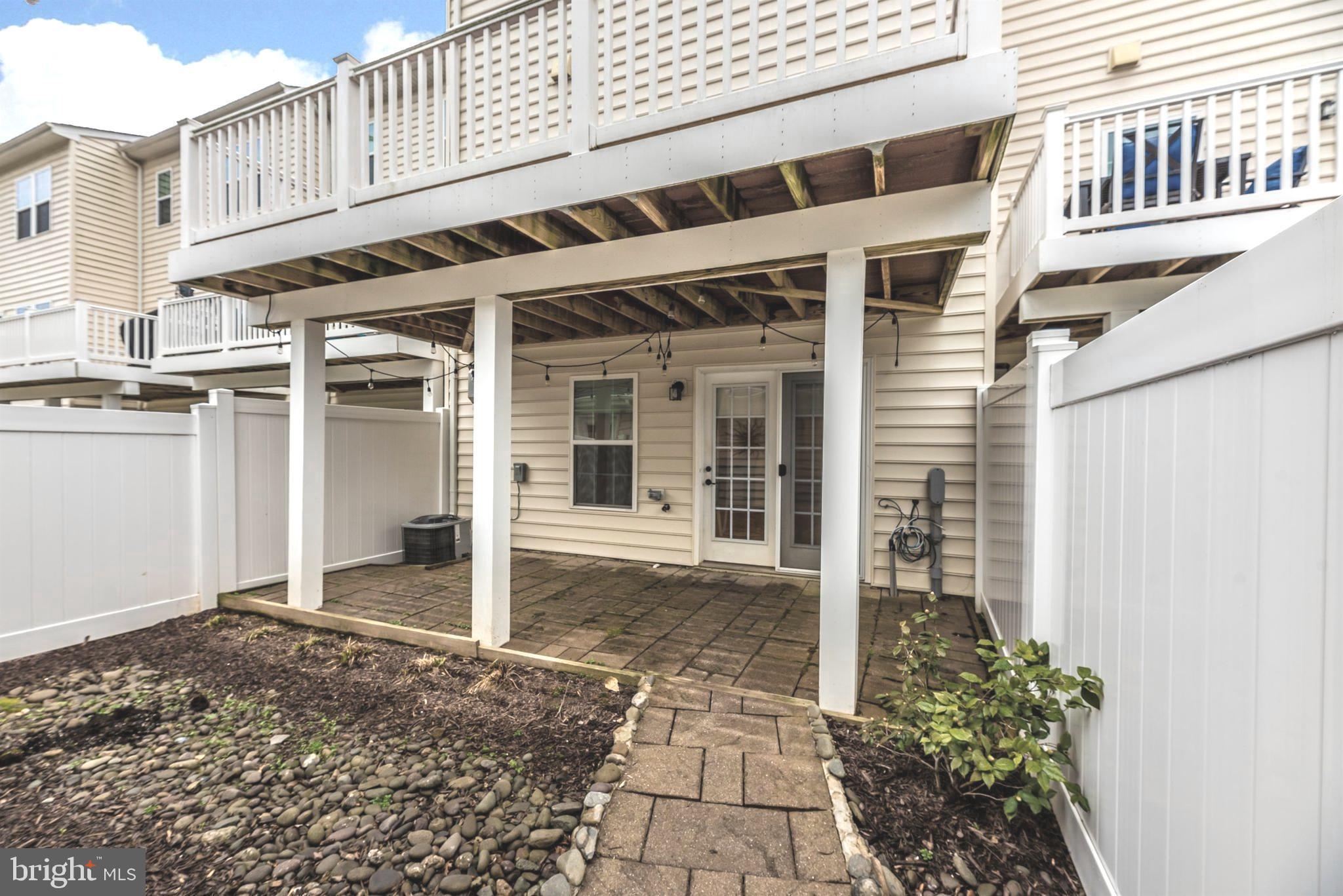 2624 Egret Way Frederick, MD 21701 - Photo 38 of 53 Paver patio from first level family room