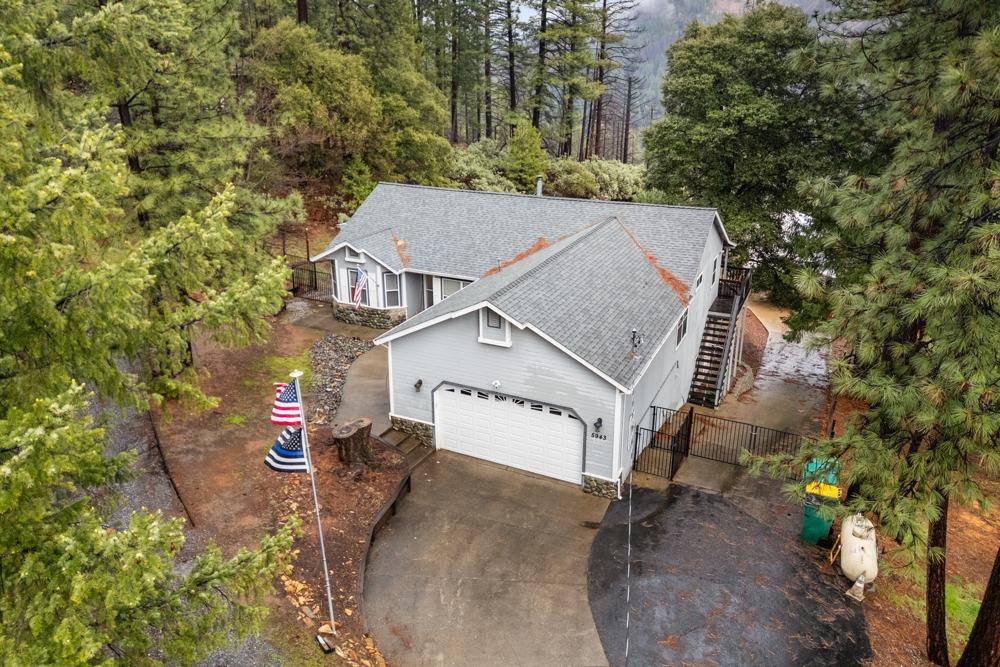 5943 Sly Park Road Placerville, CA 95667 - Photo 1 of 1 an aerial view of a house with a yard