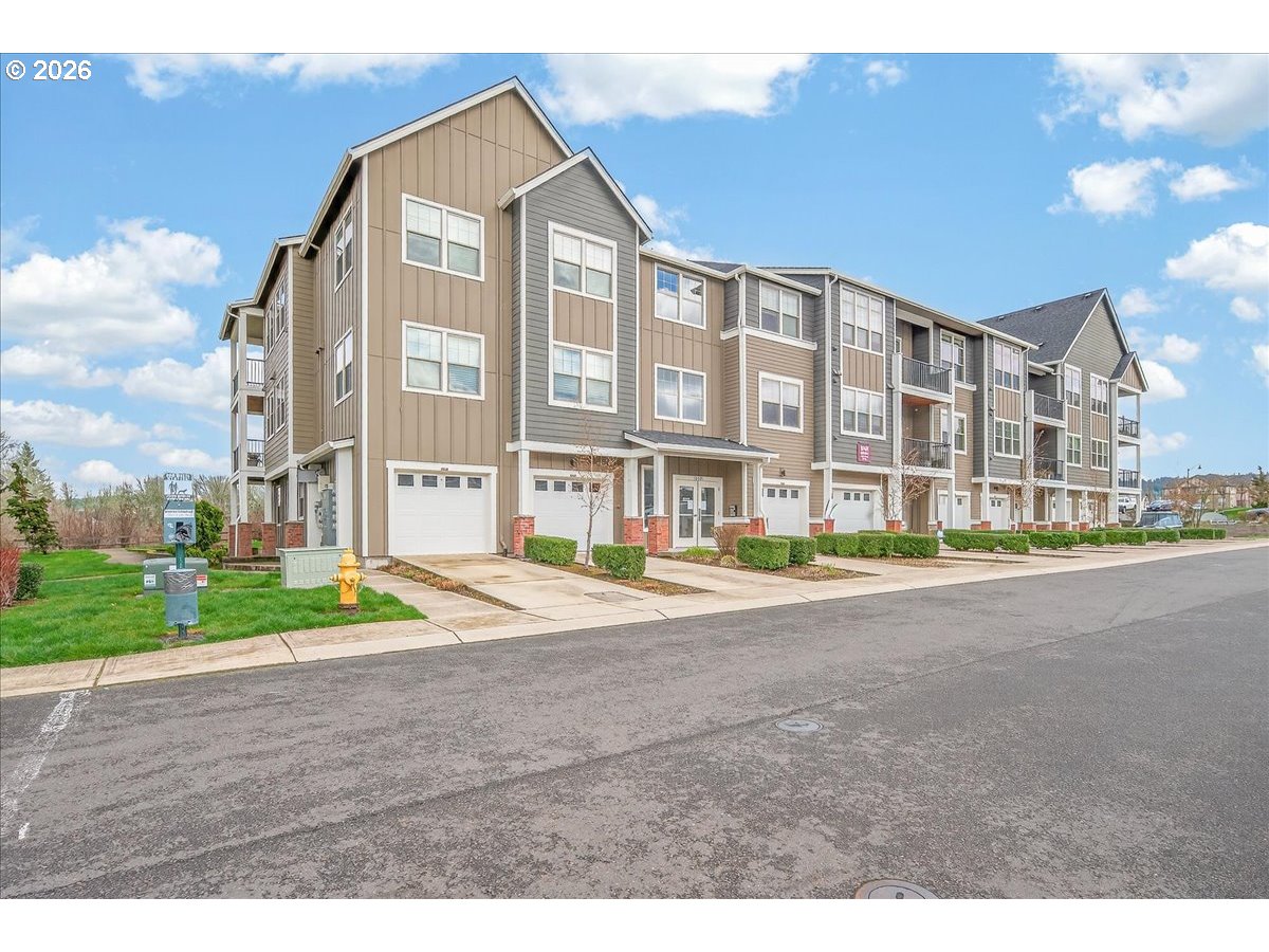 16401 Northwest Chadwick Way, Unit 108 Portland, OR 97229 - Photo 28 of 29 a view of a big building with a street