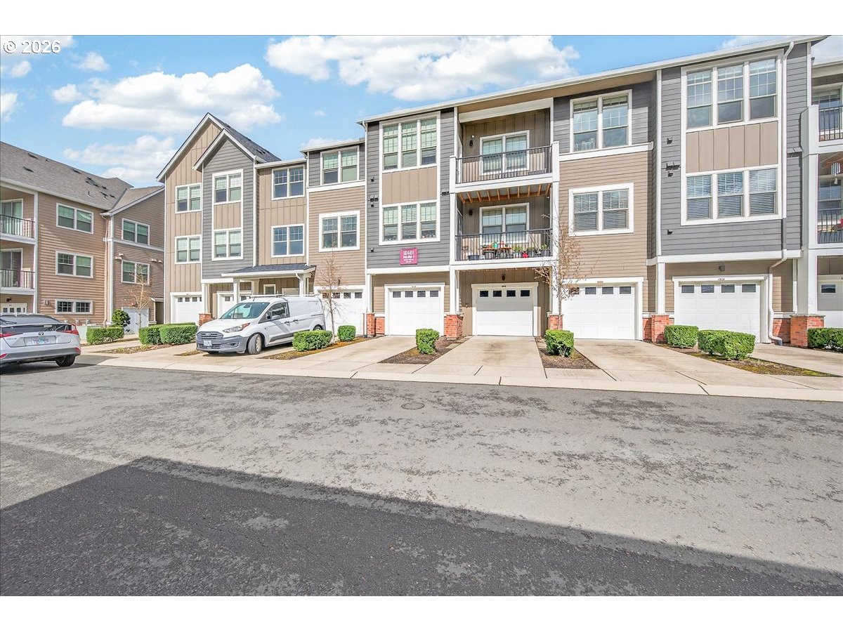 16401 Northwest Chadwick Way, Unit 108 Portland, OR 97229 - Photo 3 of 29 a view of building with car parked