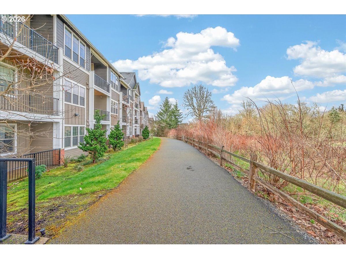 16401 Northwest Chadwick Way, Unit 108 Portland, OR 97229 - Photo 7 of 29 a view of a garden with a pathway